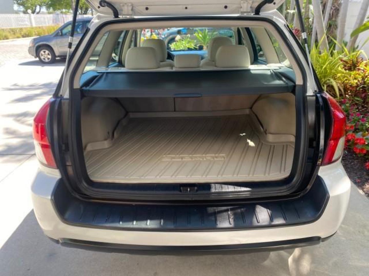 2009 Satin White Pearl /Taupe Subaru Outback Special Edition LOW MILES 68,114 (4S4BP61C697) with an 2.5L SOHC SMPI 16-Valve 4-Cyl Boxer Engine engine, Automatic transmission, located at 4701 North Dixie Hwy, Pompano Beach, FL, 33064, (954) 422-2889, 26.240938, -80.123474 - OUR WEBPAGE FLORIDACARS1.COM HAS OVER 100 PHOTOS AND FREE CARFAX LINK 2009 Subaru Outback 2.5I Special Edition 4WD VIN: 4S4BP61C697310640 4 Door Wagon/Sport Utility 2.5L H4 F SOHC 16V Gasoline 26 MPG All Wheel Drive Features 4WD/AWD ABS Brakes Air Conditioning Alloy Wheels AM/FM Stereo Automatic Tra - Photo#87