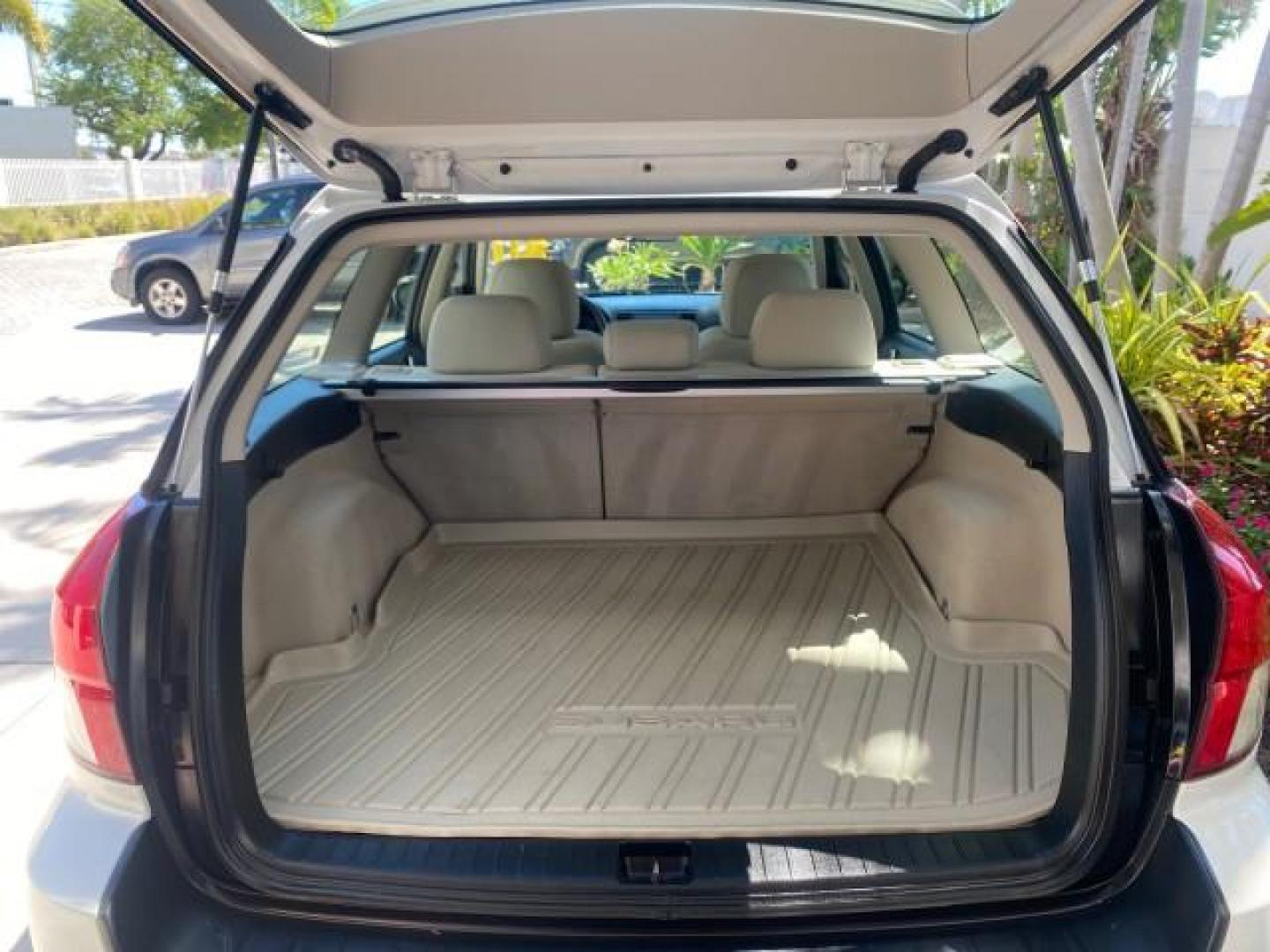 2009 Satin White Pearl /Taupe Subaru Outback Special Edition LOW MILES 68,114 (4S4BP61C697) with an 2.5L SOHC SMPI 16-Valve 4-Cyl Boxer Engine engine, Automatic transmission, located at 4701 North Dixie Hwy, Pompano Beach, FL, 33064, (954) 422-2889, 26.240938, -80.123474 - OUR WEBPAGE FLORIDACARS1.COM HAS OVER 100 PHOTOS AND FREE CARFAX LINK 2009 Subaru Outback 2.5I Special Edition 4WD VIN: 4S4BP61C697310640 4 Door Wagon/Sport Utility 2.5L H4 F SOHC 16V Gasoline 26 MPG All Wheel Drive Features 4WD/AWD ABS Brakes Air Conditioning Alloy Wheels AM/FM Stereo Automatic Tra - Photo#89