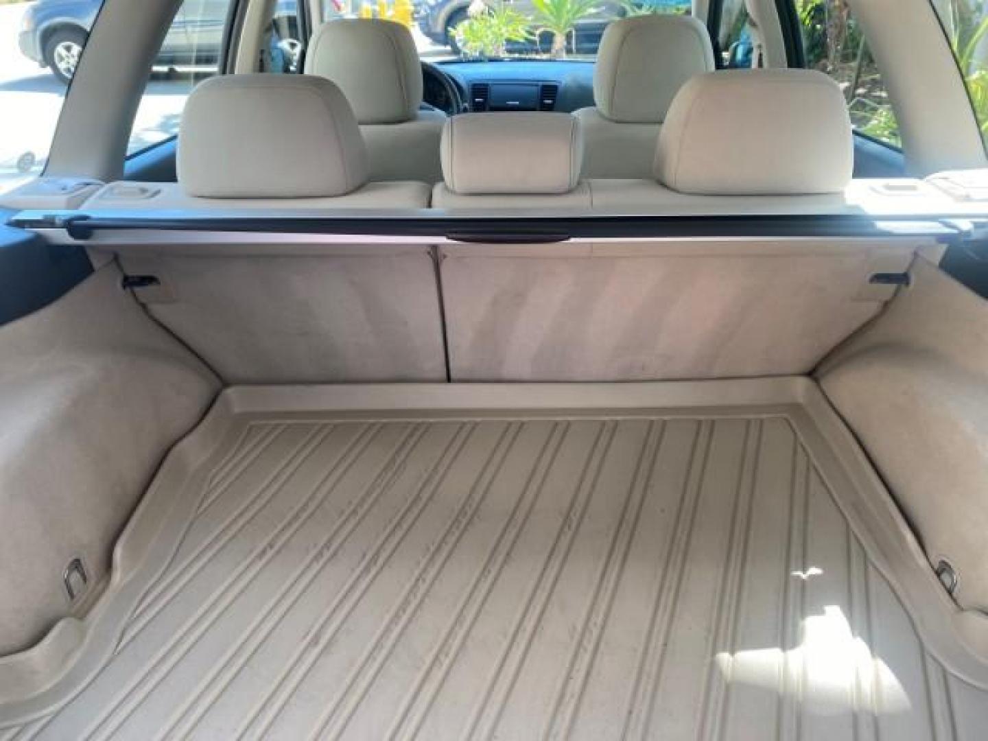 2009 Satin White Pearl /Taupe Subaru Outback Special Edition LOW MILES 68,114 (4S4BP61C697) with an 2.5L SOHC SMPI 16-Valve 4-Cyl Boxer Engine engine, Automatic transmission, located at 4701 North Dixie Hwy, Pompano Beach, FL, 33064, (954) 422-2889, 26.240938, -80.123474 - OUR WEBPAGE FLORIDACARS1.COM HAS OVER 100 PHOTOS AND FREE CARFAX LINK 2009 Subaru Outback 2.5I Special Edition 4WD VIN: 4S4BP61C697310640 4 Door Wagon/Sport Utility 2.5L H4 F SOHC 16V Gasoline 26 MPG All Wheel Drive Features 4WD/AWD ABS Brakes Air Conditioning Alloy Wheels AM/FM Stereo Automatic Tra - Photo#91