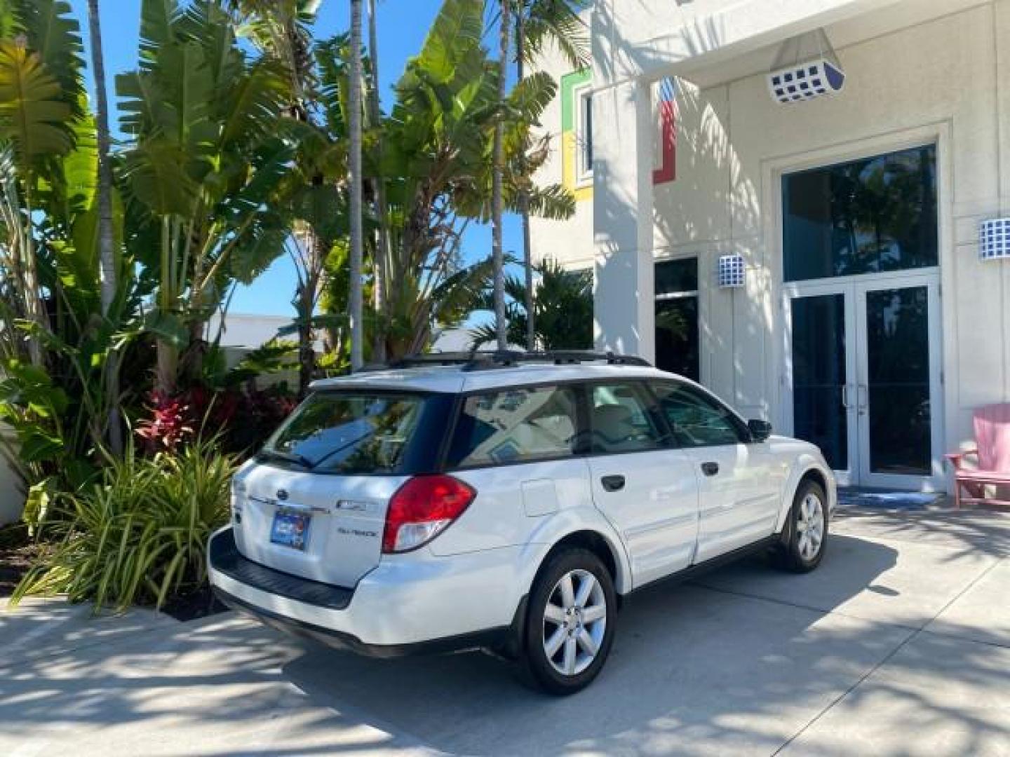 2009 Satin White Pearl /Taupe Subaru Outback Special Edition LOW MILES 68,114 (4S4BP61C697) with an 2.5L SOHC SMPI 16-Valve 4-Cyl Boxer Engine engine, Automatic transmission, located at 4701 North Dixie Hwy, Pompano Beach, FL, 33064, (954) 422-2889, 26.240938, -80.123474 - OUR WEBPAGE FLORIDACARS1.COM HAS OVER 100 PHOTOS AND FREE CARFAX LINK 2009 Subaru Outback 2.5I Special Edition 4WD VIN: 4S4BP61C697310640 4 Door Wagon/Sport Utility 2.5L H4 F SOHC 16V Gasoline 26 MPG All Wheel Drive Features 4WD/AWD ABS Brakes Air Conditioning Alloy Wheels AM/FM Stereo Automatic Tra - Photo#94
