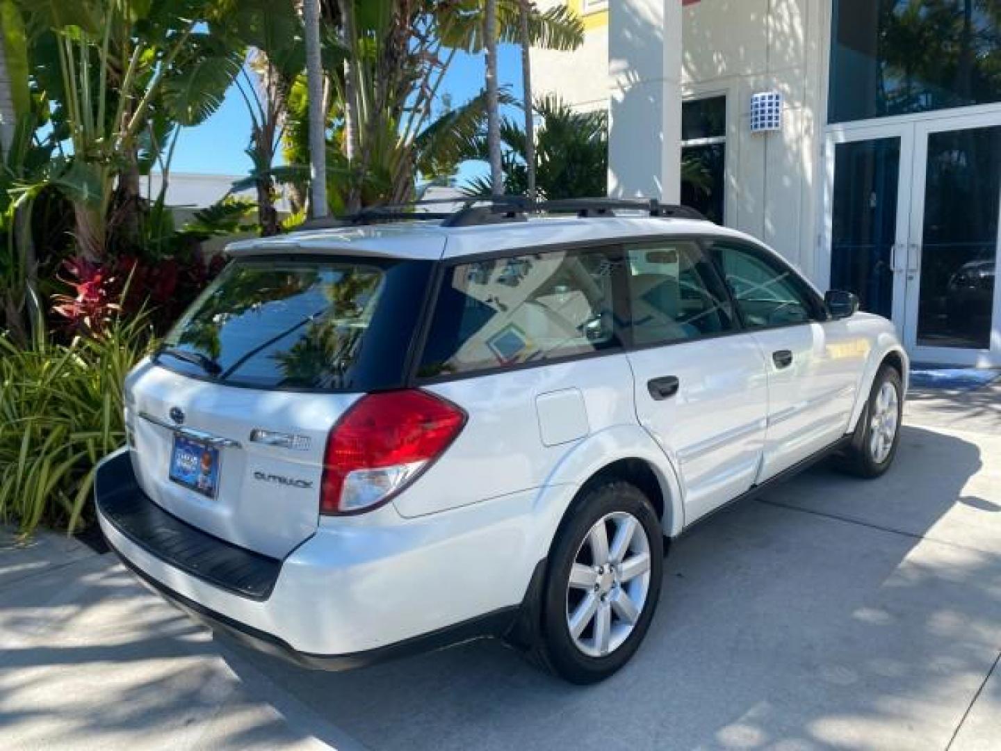 2009 Satin White Pearl /Taupe Subaru Outback Special Edition LOW MILES 68,114 (4S4BP61C697) with an 2.5L SOHC SMPI 16-Valve 4-Cyl Boxer Engine engine, Automatic transmission, located at 4701 North Dixie Hwy, Pompano Beach, FL, 33064, (954) 422-2889, 26.240938, -80.123474 - OUR WEBPAGE FLORIDACARS1.COM HAS OVER 100 PHOTOS AND FREE CARFAX LINK 2009 Subaru Outback 2.5I Special Edition 4WD VIN: 4S4BP61C697310640 4 Door Wagon/Sport Utility 2.5L H4 F SOHC 16V Gasoline 26 MPG All Wheel Drive Features 4WD/AWD ABS Brakes Air Conditioning Alloy Wheels AM/FM Stereo Automatic Tra - Photo#95