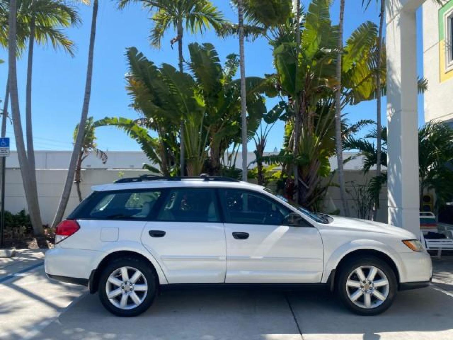 2009 Satin White Pearl /Taupe Subaru Outback Special Edition LOW MILES 68,114 (4S4BP61C697) with an 2.5L SOHC SMPI 16-Valve 4-Cyl Boxer Engine engine, Automatic transmission, located at 4701 North Dixie Hwy, Pompano Beach, FL, 33064, (954) 422-2889, 26.240938, -80.123474 - OUR WEBPAGE FLORIDACARS1.COM HAS OVER 100 PHOTOS AND FREE CARFAX LINK 2009 Subaru Outback 2.5I Special Edition 4WD VIN: 4S4BP61C697310640 4 Door Wagon/Sport Utility 2.5L H4 F SOHC 16V Gasoline 26 MPG All Wheel Drive Features 4WD/AWD ABS Brakes Air Conditioning Alloy Wheels AM/FM Stereo Automatic Tra - Photo#96