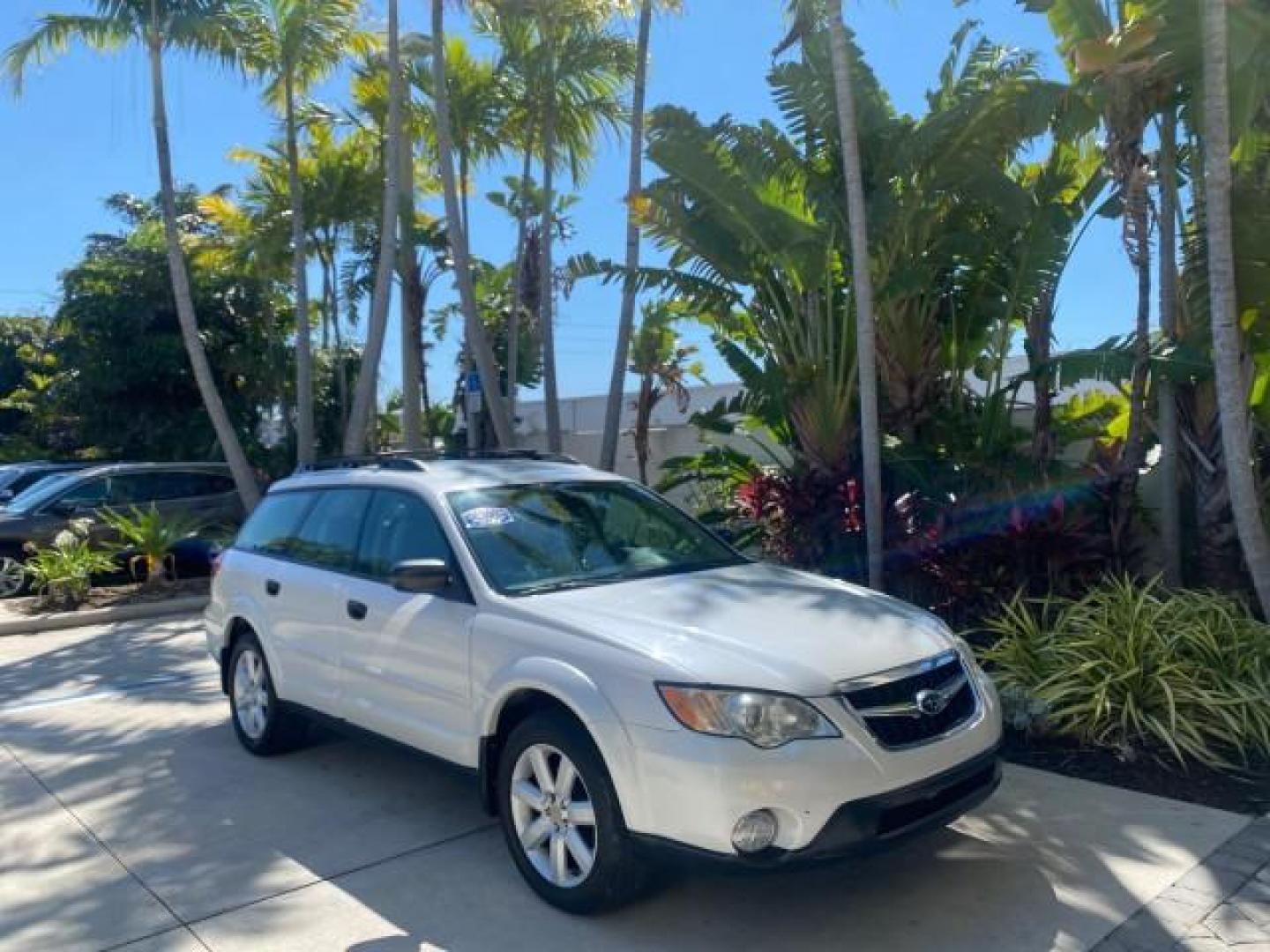 2009 Satin White Pearl /Taupe Subaru Outback Special Edition LOW MILES 68,114 (4S4BP61C697) with an 2.5L SOHC SMPI 16-Valve 4-Cyl Boxer Engine engine, Automatic transmission, located at 4701 North Dixie Hwy, Pompano Beach, FL, 33064, (954) 422-2889, 26.240938, -80.123474 - OUR WEBPAGE FLORIDACARS1.COM HAS OVER 100 PHOTOS AND FREE CARFAX LINK 2009 Subaru Outback 2.5I Special Edition 4WD VIN: 4S4BP61C697310640 4 Door Wagon/Sport Utility 2.5L H4 F SOHC 16V Gasoline 26 MPG All Wheel Drive Features 4WD/AWD ABS Brakes Air Conditioning Alloy Wheels AM/FM Stereo Automatic Tra - Photo#98