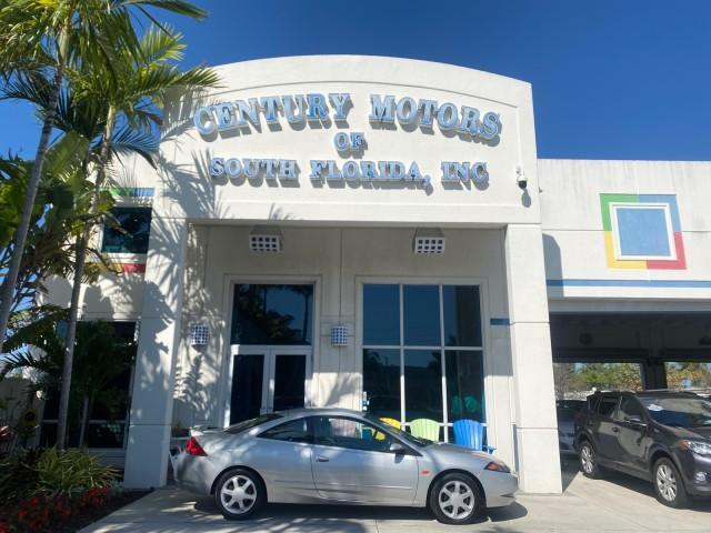 1999 Silver Frost Metallic /Greystone Mercury Cougar 3DR HATCH LOW MILES 28,846 (1ZWFT61L0X5) with an 2.5L DOHC SEFI 24-Valve V6 Duratec Engine engine, Automatic transmission, located at 4701 North Dixie Hwy, Pompano Beach, FL, 33064, (954) 422-2889, 26.240938, -80.123474 - OUR WEBPAGE FLORIDACARS1.COM HAS OVER 100 PHOTOS AND FREE CARFAX LINK 1999 MERCURY COUGAR VIN: 1ZWFT61L0X5611052 1 Z W F T 6 1 L 0 X 5 6 1 1 0 5 2 HATCHBACK 2 DR 2.5L V6 F DOHC 24V GASOLINE 30 MPG FRONT WHEEL DRIVE Features Air Conditioning Alloy Wheels AM/FM Stereo Automatic Transmission Cassette P - Photo#0