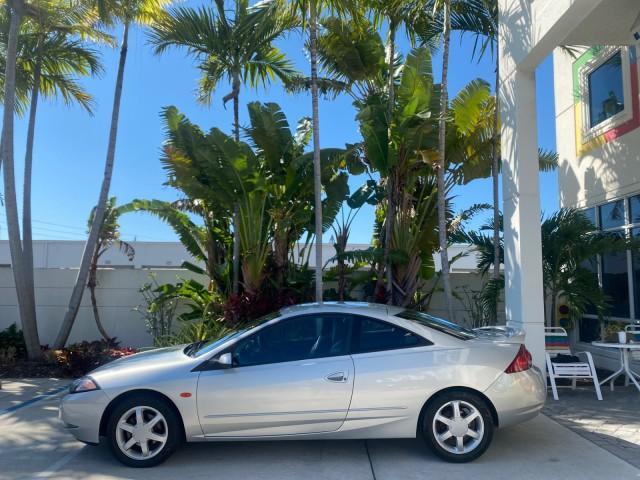 1999 Silver Frost Metallic /Greystone Mercury Cougar 3DR HATCH LOW MILES 28,846 (1ZWFT61L0X5) with an 2.5L DOHC SEFI 24-Valve V6 Duratec Engine engine, Automatic transmission, located at 4701 North Dixie Hwy, Pompano Beach, FL, 33064, (954) 422-2889, 26.240938, -80.123474 - OUR WEBPAGE FLORIDACARS1.COM HAS OVER 100 PHOTOS AND FREE CARFAX LINK 1999 MERCURY COUGAR VIN: 1ZWFT61L0X5611052 1 Z W F T 6 1 L 0 X 5 6 1 1 0 5 2 HATCHBACK 2 DR 2.5L V6 F DOHC 24V GASOLINE 30 MPG FRONT WHEEL DRIVE Features Air Conditioning Alloy Wheels AM/FM Stereo Automatic Transmission Cassette P - Photo#4