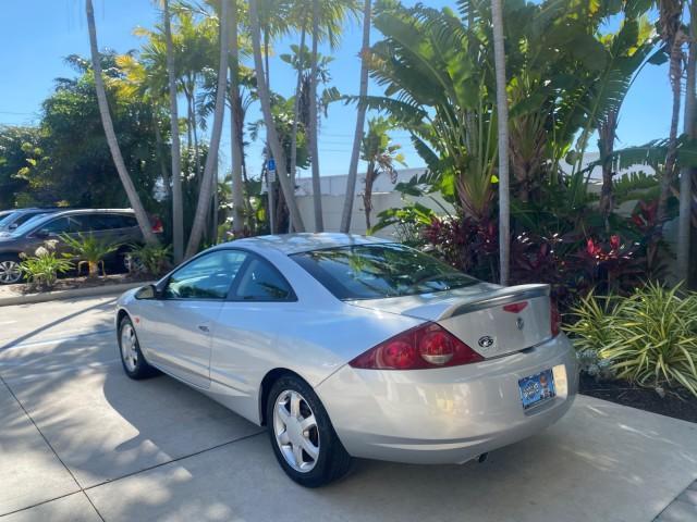 1999 Silver Frost Metallic /Greystone Mercury Cougar 3DR HATCH LOW MILES 28,846 (1ZWFT61L0X5) with an 2.5L DOHC SEFI 24-Valve V6 Duratec Engine engine, Automatic transmission, located at 4701 North Dixie Hwy, Pompano Beach, FL, 33064, (954) 422-2889, 26.240938, -80.123474 - OUR WEBPAGE FLORIDACARS1.COM HAS OVER 100 PHOTOS AND FREE CARFAX LINK 1999 MERCURY COUGAR VIN: 1ZWFT61L0X5611052 1 Z W F T 6 1 L 0 X 5 6 1 1 0 5 2 HATCHBACK 2 DR 2.5L V6 F DOHC 24V GASOLINE 30 MPG FRONT WHEEL DRIVE Features Air Conditioning Alloy Wheels AM/FM Stereo Automatic Transmission Cassette P - Photo#5