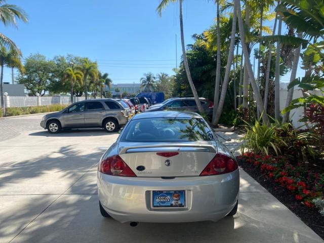 1999 Silver Frost Metallic /Greystone Mercury Cougar 3DR HATCH LOW MILES 28,846 (1ZWFT61L0X5) with an 2.5L DOHC SEFI 24-Valve V6 Duratec Engine engine, Automatic transmission, located at 4701 North Dixie Hwy, Pompano Beach, FL, 33064, (954) 422-2889, 26.240938, -80.123474 - OUR WEBPAGE FLORIDACARS1.COM HAS OVER 100 PHOTOS AND FREE CARFAX LINK 1999 MERCURY COUGAR VIN: 1ZWFT61L0X5611052 1 Z W F T 6 1 L 0 X 5 6 1 1 0 5 2 HATCHBACK 2 DR 2.5L V6 F DOHC 24V GASOLINE 30 MPG FRONT WHEEL DRIVE Features Air Conditioning Alloy Wheels AM/FM Stereo Automatic Transmission Cassette P - Photo#6