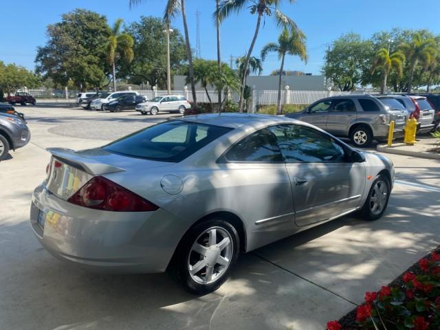 1999 Silver Frost Metallic /Greystone Mercury Cougar 3DR HATCH LOW MILES 28,846 (1ZWFT61L0X5) with an 2.5L DOHC SEFI 24-Valve V6 Duratec Engine engine, Automatic transmission, located at 4701 North Dixie Hwy, Pompano Beach, FL, 33064, (954) 422-2889, 26.240938, -80.123474 - OUR WEBPAGE FLORIDACARS1.COM HAS OVER 100 PHOTOS AND FREE CARFAX LINK 1999 MERCURY COUGAR VIN: 1ZWFT61L0X5611052 1 Z W F T 6 1 L 0 X 5 6 1 1 0 5 2 HATCHBACK 2 DR 2.5L V6 F DOHC 24V GASOLINE 30 MPG FRONT WHEEL DRIVE Features Air Conditioning Alloy Wheels AM/FM Stereo Automatic Transmission Cassette P - Photo#7