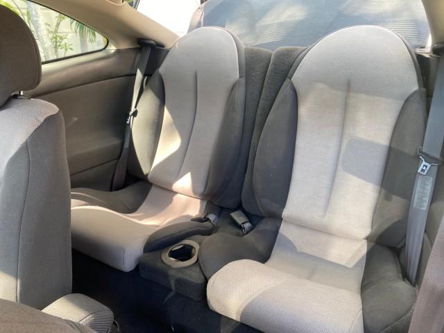 1999 Silver Frost Metallic /Greystone Mercury Cougar 3DR HATCH LOW MILES 28,846 (1ZWFT61L0X5) with an 2.5L DOHC SEFI 24-Valve V6 Duratec Engine engine, Automatic transmission, located at 4701 North Dixie Hwy, Pompano Beach, FL, 33064, (954) 422-2889, 26.240938, -80.123474 - OUR WEBPAGE FLORIDACARS1.COM HAS OVER 100 PHOTOS AND FREE CARFAX LINK 1999 MERCURY COUGAR VIN: 1ZWFT61L0X5611052 1 Z W F T 6 1 L 0 X 5 6 1 1 0 5 2 HATCHBACK 2 DR 2.5L V6 F DOHC 24V GASOLINE 30 MPG FRONT WHEEL DRIVE Features Air Conditioning Alloy Wheels AM/FM Stereo Automatic Transmission Cassette P - Photo#14