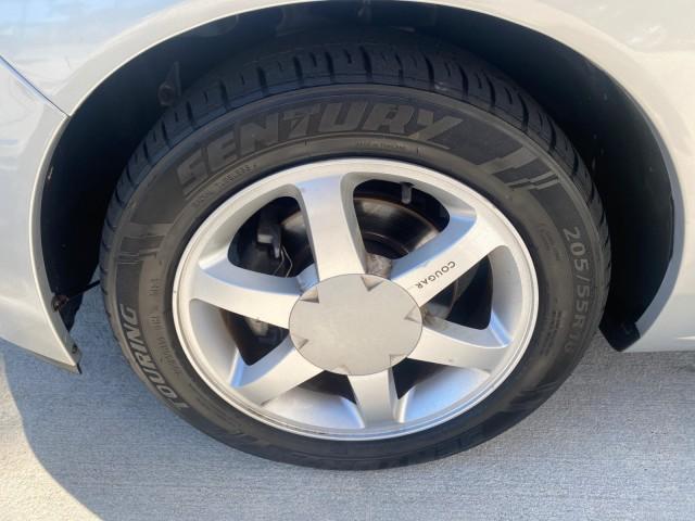 1999 Silver Frost Metallic /Greystone Mercury Cougar 3DR HATCH LOW MILES 28,846 (1ZWFT61L0X5) with an 2.5L DOHC SEFI 24-Valve V6 Duratec Engine engine, Automatic transmission, located at 4701 North Dixie Hwy, Pompano Beach, FL, 33064, (954) 422-2889, 26.240938, -80.123474 - OUR WEBPAGE FLORIDACARS1.COM HAS OVER 100 PHOTOS AND FREE CARFAX LINK 1999 MERCURY COUGAR VIN: 1ZWFT61L0X5611052 1 Z W F T 6 1 L 0 X 5 6 1 1 0 5 2 HATCHBACK 2 DR 2.5L V6 F DOHC 24V GASOLINE 30 MPG FRONT WHEEL DRIVE Features Air Conditioning Alloy Wheels AM/FM Stereo Automatic Transmission Cassette P - Photo#19