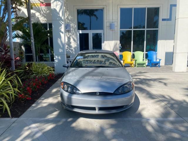 1999 Silver Frost Metallic /Greystone Mercury Cougar 3DR HATCH LOW MILES 28,846 (1ZWFT61L0X5) with an 2.5L DOHC SEFI 24-Valve V6 Duratec Engine engine, Automatic transmission, located at 4701 North Dixie Hwy, Pompano Beach, FL, 33064, (954) 422-2889, 26.240938, -80.123474 - OUR WEBPAGE FLORIDACARS1.COM HAS OVER 100 PHOTOS AND FREE CARFAX LINK 1999 MERCURY COUGAR VIN: 1ZWFT61L0X5611052 1 Z W F T 6 1 L 0 X 5 6 1 1 0 5 2 HATCHBACK 2 DR 2.5L V6 F DOHC 24V GASOLINE 30 MPG FRONT WHEEL DRIVE Features Air Conditioning Alloy Wheels AM/FM Stereo Automatic Transmission Cassette P - Photo#26