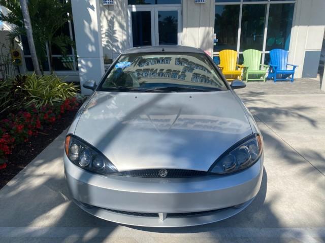 1999 Silver Frost Metallic /Greystone Mercury Cougar 3DR HATCH LOW MILES 28,846 (1ZWFT61L0X5) with an 2.5L DOHC SEFI 24-Valve V6 Duratec Engine engine, Automatic transmission, located at 4701 North Dixie Hwy, Pompano Beach, FL, 33064, (954) 422-2889, 26.240938, -80.123474 - OUR WEBPAGE FLORIDACARS1.COM HAS OVER 100 PHOTOS AND FREE CARFAX LINK 1999 MERCURY COUGAR VIN: 1ZWFT61L0X5611052 1 Z W F T 6 1 L 0 X 5 6 1 1 0 5 2 HATCHBACK 2 DR 2.5L V6 F DOHC 24V GASOLINE 30 MPG FRONT WHEEL DRIVE Features Air Conditioning Alloy Wheels AM/FM Stereo Automatic Transmission Cassette P - Photo#27