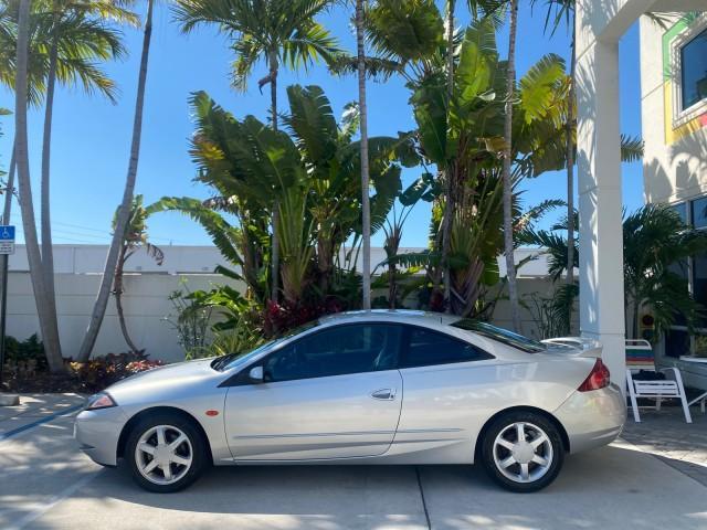 1999 Silver Frost Metallic /Greystone Mercury Cougar 3DR HATCH LOW MILES 28,846 (1ZWFT61L0X5) with an 2.5L DOHC SEFI 24-Valve V6 Duratec Engine engine, Automatic transmission, located at 4701 North Dixie Hwy, Pompano Beach, FL, 33064, (954) 422-2889, 26.240938, -80.123474 - OUR WEBPAGE FLORIDACARS1.COM HAS OVER 100 PHOTOS AND FREE CARFAX LINK 1999 MERCURY COUGAR VIN: 1ZWFT61L0X5611052 1 Z W F T 6 1 L 0 X 5 6 1 1 0 5 2 HATCHBACK 2 DR 2.5L V6 F DOHC 24V GASOLINE 30 MPG FRONT WHEEL DRIVE Features Air Conditioning Alloy Wheels AM/FM Stereo Automatic Transmission Cassette P - Photo#30