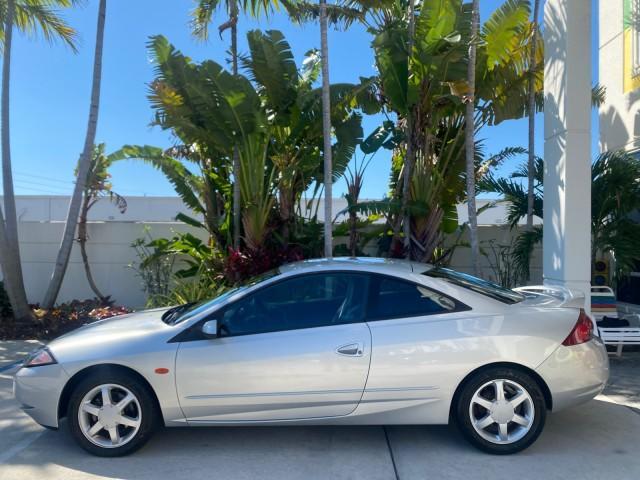1999 Silver Frost Metallic /Greystone Mercury Cougar 3DR HATCH LOW MILES 28,846 (1ZWFT61L0X5) with an 2.5L DOHC SEFI 24-Valve V6 Duratec Engine engine, Automatic transmission, located at 4701 North Dixie Hwy, Pompano Beach, FL, 33064, (954) 422-2889, 26.240938, -80.123474 - OUR WEBPAGE FLORIDACARS1.COM HAS OVER 100 PHOTOS AND FREE CARFAX LINK 1999 MERCURY COUGAR VIN: 1ZWFT61L0X5611052 1 Z W F T 6 1 L 0 X 5 6 1 1 0 5 2 HATCHBACK 2 DR 2.5L V6 F DOHC 24V GASOLINE 30 MPG FRONT WHEEL DRIVE Features Air Conditioning Alloy Wheels AM/FM Stereo Automatic Transmission Cassette P - Photo#31