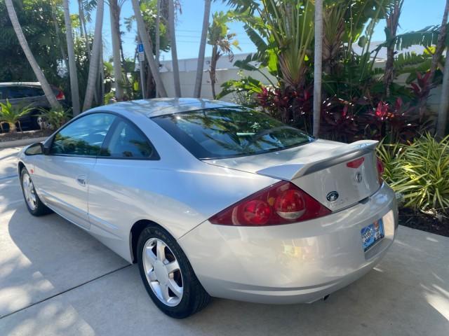 1999 Silver Frost Metallic /Greystone Mercury Cougar 3DR HATCH LOW MILES 28,846 (1ZWFT61L0X5) with an 2.5L DOHC SEFI 24-Valve V6 Duratec Engine engine, Automatic transmission, located at 4701 North Dixie Hwy, Pompano Beach, FL, 33064, (954) 422-2889, 26.240938, -80.123474 - OUR WEBPAGE FLORIDACARS1.COM HAS OVER 100 PHOTOS AND FREE CARFAX LINK 1999 MERCURY COUGAR VIN: 1ZWFT61L0X5611052 1 Z W F T 6 1 L 0 X 5 6 1 1 0 5 2 HATCHBACK 2 DR 2.5L V6 F DOHC 24V GASOLINE 30 MPG FRONT WHEEL DRIVE Features Air Conditioning Alloy Wheels AM/FM Stereo Automatic Transmission Cassette P - Photo#33