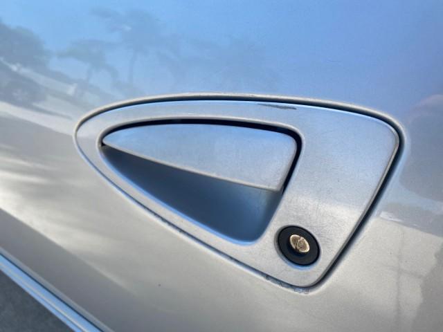 1999 Silver Frost Metallic /Greystone Mercury Cougar 3DR HATCH LOW MILES 28,846 (1ZWFT61L0X5) with an 2.5L DOHC SEFI 24-Valve V6 Duratec Engine engine, Automatic transmission, located at 4701 North Dixie Hwy, Pompano Beach, FL, 33064, (954) 422-2889, 26.240938, -80.123474 - OUR WEBPAGE FLORIDACARS1.COM HAS OVER 100 PHOTOS AND FREE CARFAX LINK 1999 MERCURY COUGAR VIN: 1ZWFT61L0X5611052 1 Z W F T 6 1 L 0 X 5 6 1 1 0 5 2 HATCHBACK 2 DR 2.5L V6 F DOHC 24V GASOLINE 30 MPG FRONT WHEEL DRIVE Features Air Conditioning Alloy Wheels AM/FM Stereo Automatic Transmission Cassette P - Photo#38