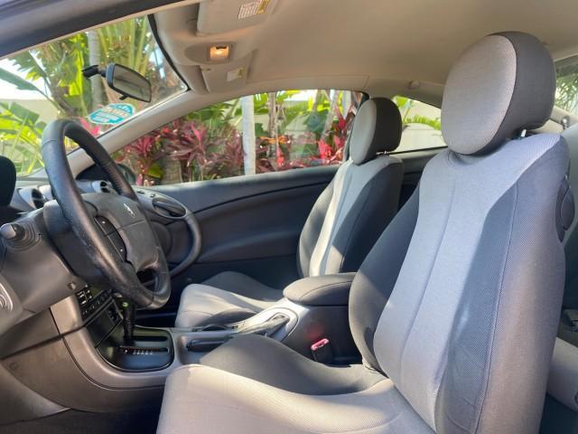 1999 Silver Frost Metallic /Greystone Mercury Cougar 3DR HATCH LOW MILES 28,846 (1ZWFT61L0X5) with an 2.5L DOHC SEFI 24-Valve V6 Duratec Engine engine, Automatic transmission, located at 4701 North Dixie Hwy, Pompano Beach, FL, 33064, (954) 422-2889, 26.240938, -80.123474 - OUR WEBPAGE FLORIDACARS1.COM HAS OVER 100 PHOTOS AND FREE CARFAX LINK 1999 MERCURY COUGAR VIN: 1ZWFT61L0X5611052 1 Z W F T 6 1 L 0 X 5 6 1 1 0 5 2 HATCHBACK 2 DR 2.5L V6 F DOHC 24V GASOLINE 30 MPG FRONT WHEEL DRIVE Features Air Conditioning Alloy Wheels AM/FM Stereo Automatic Transmission Cassette P - Photo#44