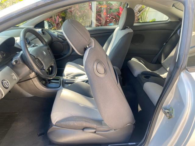 1999 Silver Frost Metallic /Greystone Mercury Cougar 3DR HATCH LOW MILES 28,846 (1ZWFT61L0X5) with an 2.5L DOHC SEFI 24-Valve V6 Duratec Engine engine, Automatic transmission, located at 4701 North Dixie Hwy, Pompano Beach, FL, 33064, (954) 422-2889, 26.240938, -80.123474 - OUR WEBPAGE FLORIDACARS1.COM HAS OVER 100 PHOTOS AND FREE CARFAX LINK 1999 MERCURY COUGAR VIN: 1ZWFT61L0X5611052 1 Z W F T 6 1 L 0 X 5 6 1 1 0 5 2 HATCHBACK 2 DR 2.5L V6 F DOHC 24V GASOLINE 30 MPG FRONT WHEEL DRIVE Features Air Conditioning Alloy Wheels AM/FM Stereo Automatic Transmission Cassette P - Photo#71