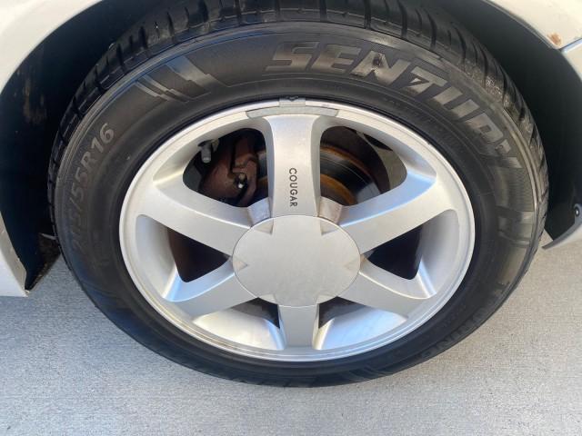 1999 Silver Frost Metallic /Greystone Mercury Cougar 3DR HATCH LOW MILES 28,846 (1ZWFT61L0X5) with an 2.5L DOHC SEFI 24-Valve V6 Duratec Engine engine, Automatic transmission, located at 4701 North Dixie Hwy, Pompano Beach, FL, 33064, (954) 422-2889, 26.240938, -80.123474 - OUR WEBPAGE FLORIDACARS1.COM HAS OVER 100 PHOTOS AND FREE CARFAX LINK 1999 MERCURY COUGAR VIN: 1ZWFT61L0X5611052 1 Z W F T 6 1 L 0 X 5 6 1 1 0 5 2 HATCHBACK 2 DR 2.5L V6 F DOHC 24V GASOLINE 30 MPG FRONT WHEEL DRIVE Features Air Conditioning Alloy Wheels AM/FM Stereo Automatic Transmission Cassette P - Photo#76