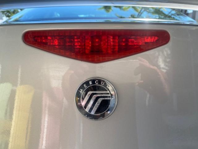 1999 Silver Frost Metallic /Greystone Mercury Cougar 3DR HATCH LOW MILES 28,846 (1ZWFT61L0X5) with an 2.5L DOHC SEFI 24-Valve V6 Duratec Engine engine, Automatic transmission, located at 4701 North Dixie Hwy, Pompano Beach, FL, 33064, (954) 422-2889, 26.240938, -80.123474 - OUR WEBPAGE FLORIDACARS1.COM HAS OVER 100 PHOTOS AND FREE CARFAX LINK 1999 MERCURY COUGAR VIN: 1ZWFT61L0X5611052 1 Z W F T 6 1 L 0 X 5 6 1 1 0 5 2 HATCHBACK 2 DR 2.5L V6 F DOHC 24V GASOLINE 30 MPG FRONT WHEEL DRIVE Features Air Conditioning Alloy Wheels AM/FM Stereo Automatic Transmission Cassette P - Photo#82