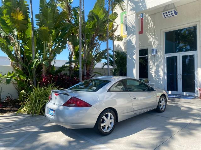 1999 Silver Frost Metallic /Greystone Mercury Cougar 3DR HATCH LOW MILES 28,846 (1ZWFT61L0X5) with an 2.5L DOHC SEFI 24-Valve V6 Duratec Engine engine, Automatic transmission, located at 4701 North Dixie Hwy, Pompano Beach, FL, 33064, (954) 422-2889, 26.240938, -80.123474 - OUR WEBPAGE FLORIDACARS1.COM HAS OVER 100 PHOTOS AND FREE CARFAX LINK 1999 MERCURY COUGAR VIN: 1ZWFT61L0X5611052 1 Z W F T 6 1 L 0 X 5 6 1 1 0 5 2 HATCHBACK 2 DR 2.5L V6 F DOHC 24V GASOLINE 30 MPG FRONT WHEEL DRIVE Features Air Conditioning Alloy Wheels AM/FM Stereo Automatic Transmission Cassette P - Photo#92