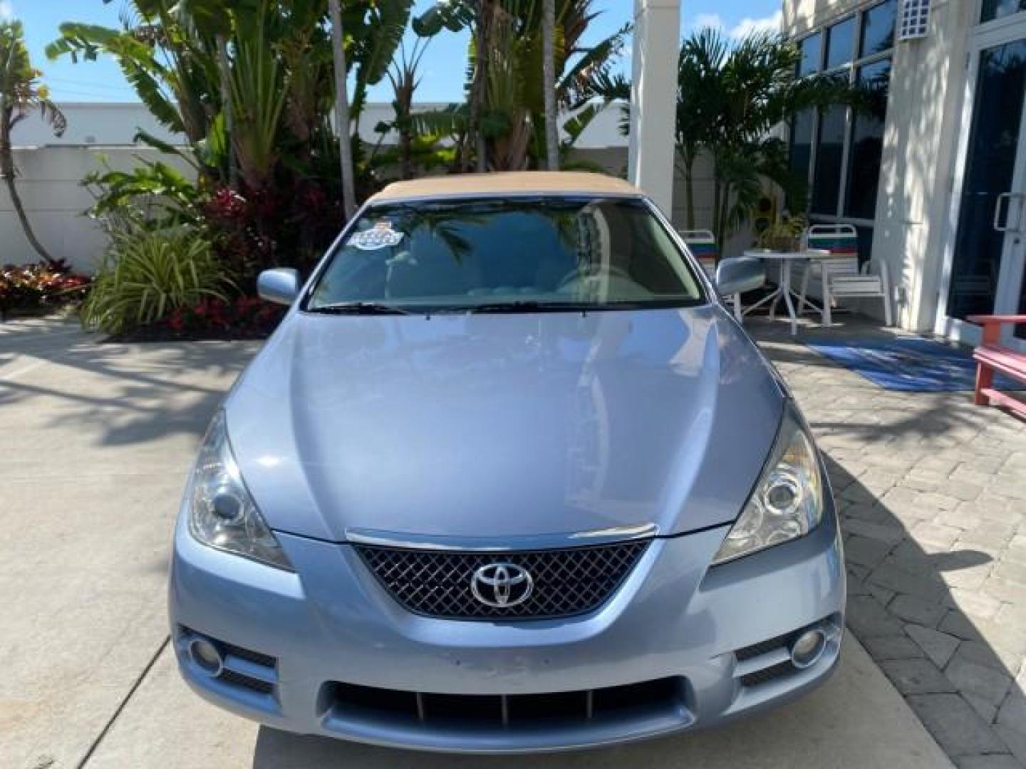 2007 Cosmic Blue Metallic /Ivory Toyota Camry Solara SLE LOW MILES 60,485 1 OWNER FL (4T1FA38P57U) with an 3.3L DOHC SMPI VVT-i 24-Valve V6 Engine engine, Automatic transmission, located at 4701 North Dixie Hwy, Pompano Beach, FL, 33064, (954) 422-2889, 26.240938, -80.123474 - OUR WEBPAGE FLORIDACARS1.COM HAS OVER 100 PHOTOS AND FREE CARFAX LINK 2007 Toyota Camry Solara SLE V6 1 OWNER FL Convertible 3.3L V6 F DOHC 24V Gasoline Front Wheel Drive Features ABS Brakes Air Conditioning Alloy Wheels AM/FM Stereo Automatic Transmission Auxiliary Audio Input Bluetooth Technology - Photo#2