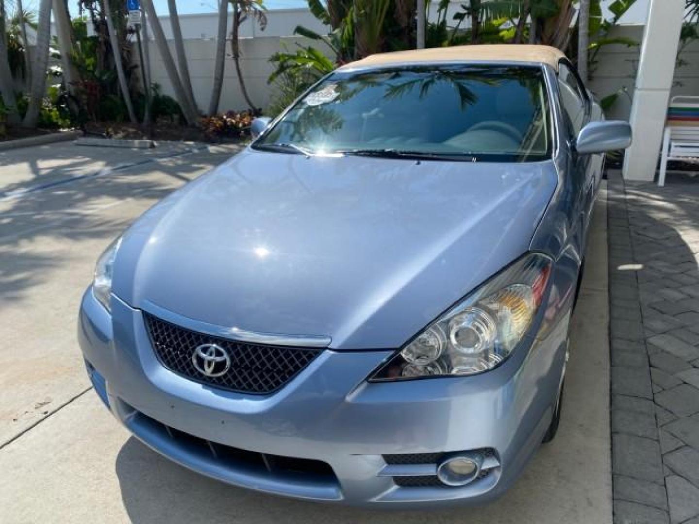 2007 Cosmic Blue Metallic /Ivory Toyota Camry Solara SLE LOW MILES 60,485 1 OWNER FL (4T1FA38P57U) with an 3.3L DOHC SMPI VVT-i 24-Valve V6 Engine engine, Automatic transmission, located at 4701 North Dixie Hwy, Pompano Beach, FL, 33064, (954) 422-2889, 26.240938, -80.123474 - OUR WEBPAGE FLORIDACARS1.COM HAS OVER 100 PHOTOS AND FREE CARFAX LINK 2007 Toyota Camry Solara SLE V6 1 OWNER FL Convertible 3.3L V6 F DOHC 24V Gasoline Front Wheel Drive Features ABS Brakes Air Conditioning Alloy Wheels AM/FM Stereo Automatic Transmission Auxiliary Audio Input Bluetooth Technology - Photo#3