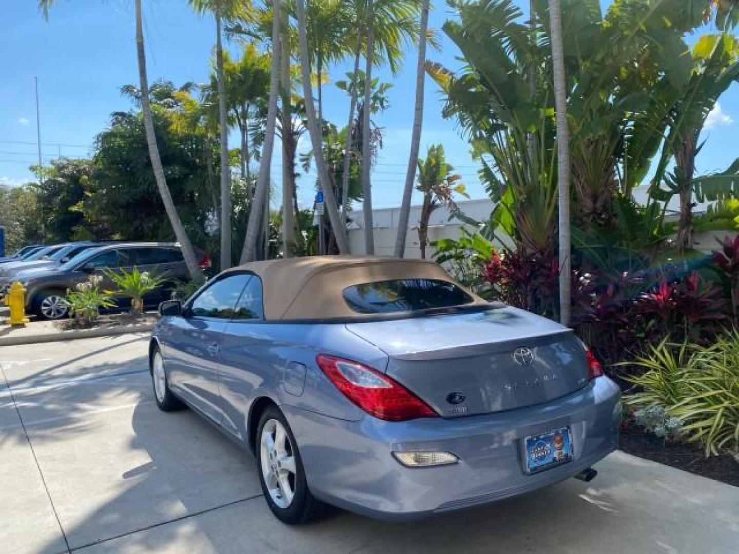 2007 Cosmic Blue Metallic /Ivory Toyota Camry Solara SLE LOW MILES 60,485 1 OWNER FL (4T1FA38P57U) with an 3.3L DOHC SMPI VVT-i 24-Valve V6 Engine engine, Automatic transmission, located at 4701 North Dixie Hwy, Pompano Beach, FL, 33064, (954) 422-2889, 26.240938, -80.123474 - OUR WEBPAGE FLORIDACARS1.COM HAS OVER 100 PHOTOS AND FREE CARFAX LINK 2007 Toyota Camry Solara SLE V6 1 OWNER FL Convertible 3.3L V6 F DOHC 24V Gasoline Front Wheel Drive Features ABS Brakes Air Conditioning Alloy Wheels AM/FM Stereo Automatic Transmission Auxiliary Audio Input Bluetooth Technology - Photo#5