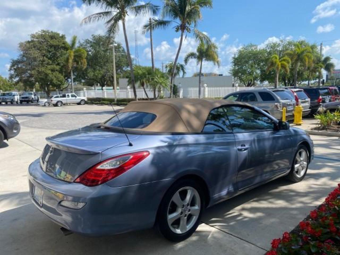 2007 Cosmic Blue Metallic /Ivory Toyota Camry Solara SLE LOW MILES 60,485 1 OWNER FL (4T1FA38P57U) with an 3.3L DOHC SMPI VVT-i 24-Valve V6 Engine engine, Automatic transmission, located at 4701 North Dixie Hwy, Pompano Beach, FL, 33064, (954) 422-2889, 26.240938, -80.123474 - OUR WEBPAGE FLORIDACARS1.COM HAS OVER 100 PHOTOS AND FREE CARFAX LINK 2007 Toyota Camry Solara SLE V6 1 OWNER FL Convertible 3.3L V6 F DOHC 24V Gasoline Front Wheel Drive Features ABS Brakes Air Conditioning Alloy Wheels AM/FM Stereo Automatic Transmission Auxiliary Audio Input Bluetooth Technology - Photo#7
