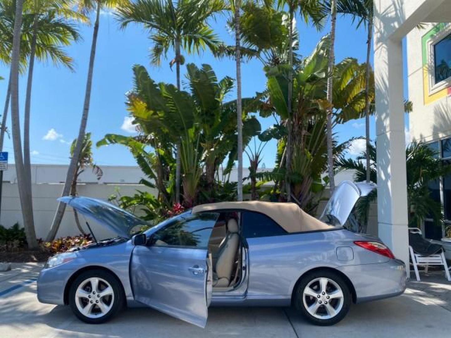 2007 Cosmic Blue Metallic /Ivory Toyota Camry Solara SLE LOW MILES 60,485 1 OWNER FL (4T1FA38P57U) with an 3.3L DOHC SMPI VVT-i 24-Valve V6 Engine engine, Automatic transmission, located at 4701 North Dixie Hwy, Pompano Beach, FL, 33064, (954) 422-2889, 26.240938, -80.123474 - OUR WEBPAGE FLORIDACARS1.COM HAS OVER 100 PHOTOS AND FREE CARFAX LINK 2007 Toyota Camry Solara SLE V6 1 OWNER FL Convertible 3.3L V6 F DOHC 24V Gasoline Front Wheel Drive Features ABS Brakes Air Conditioning Alloy Wheels AM/FM Stereo Automatic Transmission Auxiliary Audio Input Bluetooth Technology - Photo#8