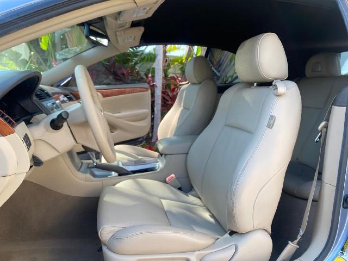 2007 Cosmic Blue Metallic /Ivory Toyota Camry Solara SLE LOW MILES 60,485 1 OWNER FL (4T1FA38P57U) with an 3.3L DOHC SMPI VVT-i 24-Valve V6 Engine engine, Automatic transmission, located at 4701 North Dixie Hwy, Pompano Beach, FL, 33064, (954) 422-2889, 26.240938, -80.123474 - OUR WEBPAGE FLORIDACARS1.COM HAS OVER 100 PHOTOS AND FREE CARFAX LINK 2007 Toyota Camry Solara SLE V6 1 OWNER FL Convertible 3.3L V6 F DOHC 24V Gasoline Front Wheel Drive Features ABS Brakes Air Conditioning Alloy Wheels AM/FM Stereo Automatic Transmission Auxiliary Audio Input Bluetooth Technology - Photo#10