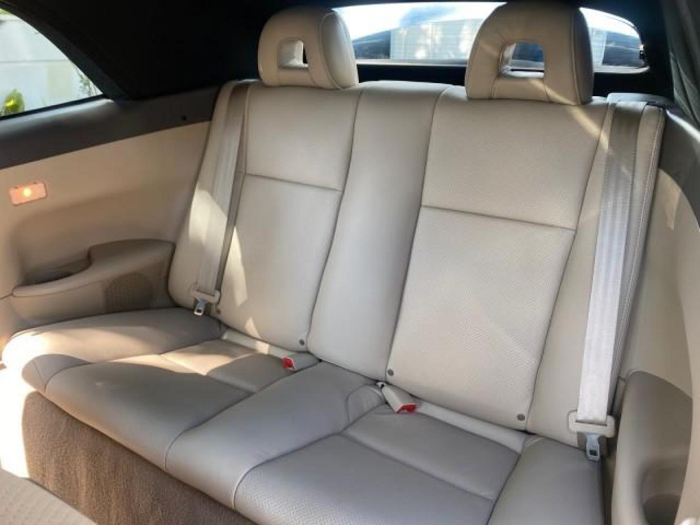 2007 Cosmic Blue Metallic /Ivory Toyota Camry Solara SLE LOW MILES 60,485 1 OWNER FL (4T1FA38P57U) with an 3.3L DOHC SMPI VVT-i 24-Valve V6 Engine engine, Automatic transmission, located at 4701 North Dixie Hwy, Pompano Beach, FL, 33064, (954) 422-2889, 26.240938, -80.123474 - OUR WEBPAGE FLORIDACARS1.COM HAS OVER 100 PHOTOS AND FREE CARFAX LINK 2007 Toyota Camry Solara SLE V6 1 OWNER FL Convertible 3.3L V6 F DOHC 24V Gasoline Front Wheel Drive Features ABS Brakes Air Conditioning Alloy Wheels AM/FM Stereo Automatic Transmission Auxiliary Audio Input Bluetooth Technology - Photo#14