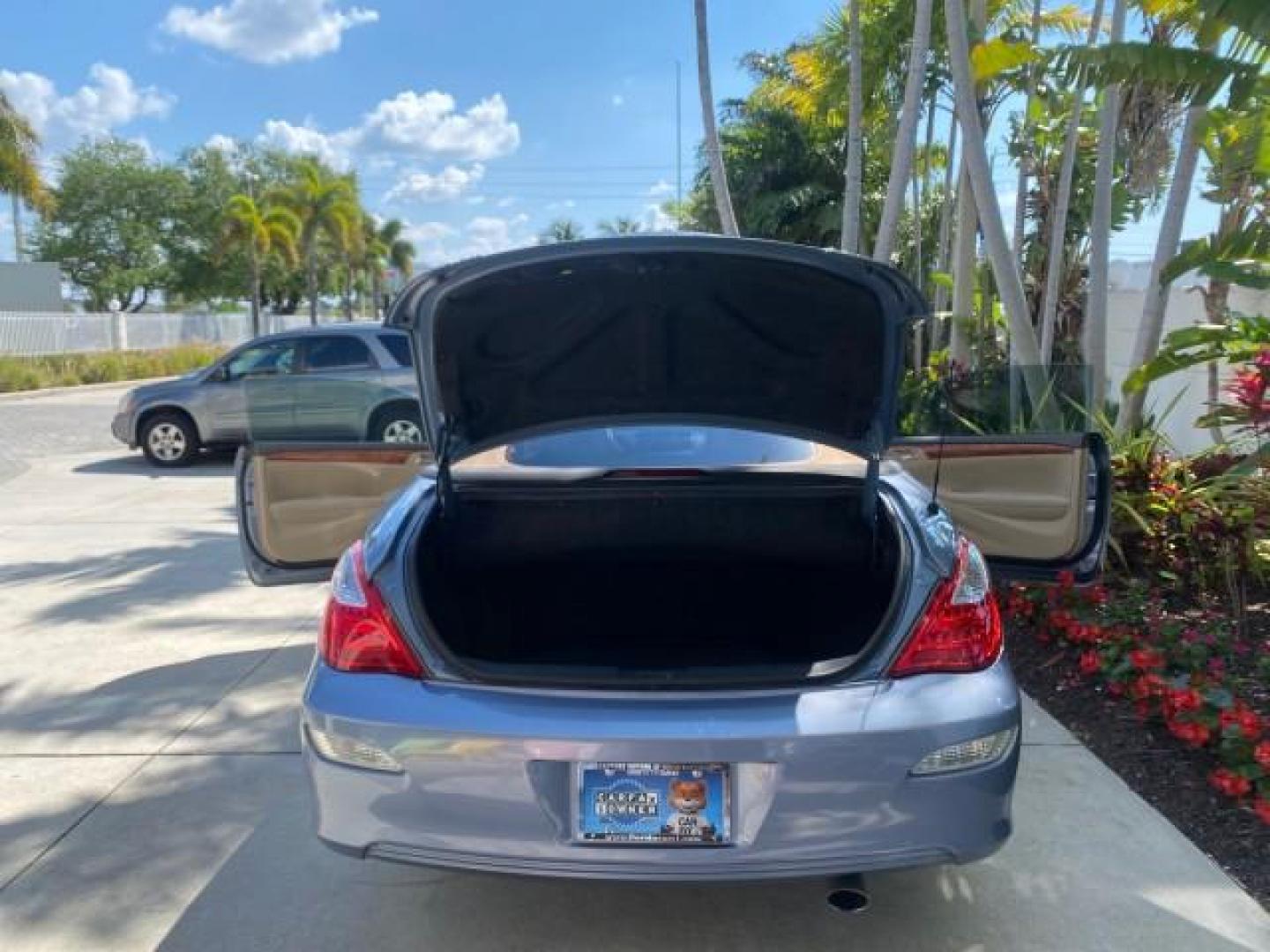 2007 Cosmic Blue Metallic /Ivory Toyota Camry Solara SLE LOW MILES 60,485 1 OWNER FL (4T1FA38P57U) with an 3.3L DOHC SMPI VVT-i 24-Valve V6 Engine engine, Automatic transmission, located at 4701 North Dixie Hwy, Pompano Beach, FL, 33064, (954) 422-2889, 26.240938, -80.123474 - OUR WEBPAGE FLORIDACARS1.COM HAS OVER 100 PHOTOS AND FREE CARFAX LINK 2007 Toyota Camry Solara SLE V6 1 OWNER FL Convertible 3.3L V6 F DOHC 24V Gasoline Front Wheel Drive Features ABS Brakes Air Conditioning Alloy Wheels AM/FM Stereo Automatic Transmission Auxiliary Audio Input Bluetooth Technology - Photo#15