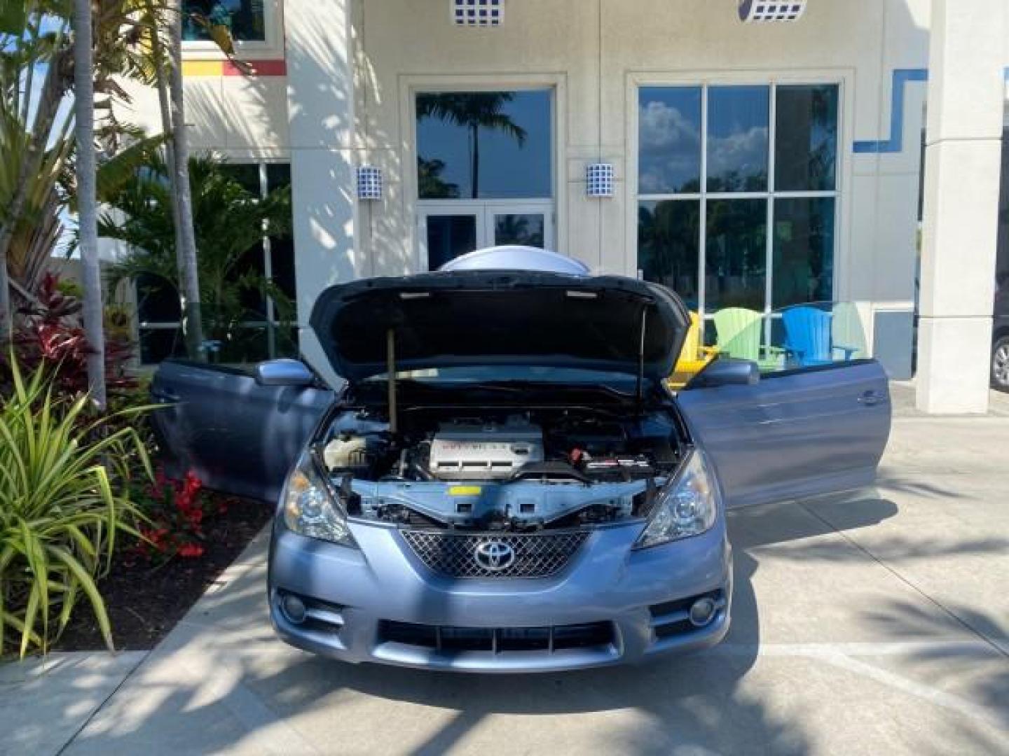 2007 Cosmic Blue Metallic /Ivory Toyota Camry Solara SLE LOW MILES 60,485 1 OWNER FL (4T1FA38P57U) with an 3.3L DOHC SMPI VVT-i 24-Valve V6 Engine engine, Automatic transmission, located at 4701 North Dixie Hwy, Pompano Beach, FL, 33064, (954) 422-2889, 26.240938, -80.123474 - OUR WEBPAGE FLORIDACARS1.COM HAS OVER 100 PHOTOS AND FREE CARFAX LINK 2007 Toyota Camry Solara SLE V6 1 OWNER FL Convertible 3.3L V6 F DOHC 24V Gasoline Front Wheel Drive Features ABS Brakes Air Conditioning Alloy Wheels AM/FM Stereo Automatic Transmission Auxiliary Audio Input Bluetooth Technology - Photo#16
