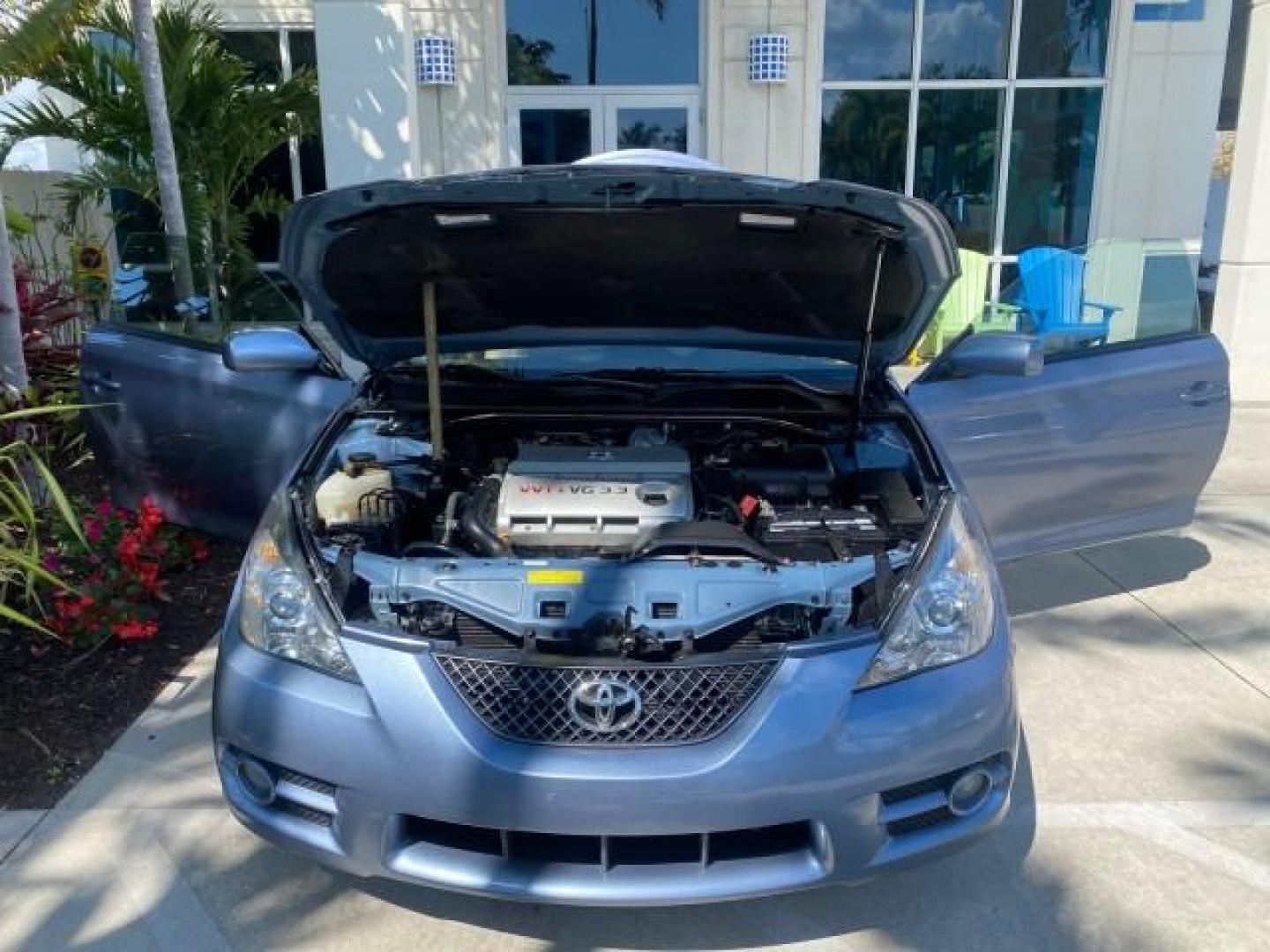 2007 Cosmic Blue Metallic /Ivory Toyota Camry Solara SLE LOW MILES 60,485 1 OWNER FL (4T1FA38P57U) with an 3.3L DOHC SMPI VVT-i 24-Valve V6 Engine engine, Automatic transmission, located at 4701 North Dixie Hwy, Pompano Beach, FL, 33064, (954) 422-2889, 26.240938, -80.123474 - OUR WEBPAGE FLORIDACARS1.COM HAS OVER 100 PHOTOS AND FREE CARFAX LINK 2007 Toyota Camry Solara SLE V6 1 OWNER FL Convertible 3.3L V6 F DOHC 24V Gasoline Front Wheel Drive Features ABS Brakes Air Conditioning Alloy Wheels AM/FM Stereo Automatic Transmission Auxiliary Audio Input Bluetooth Technology - Photo#17