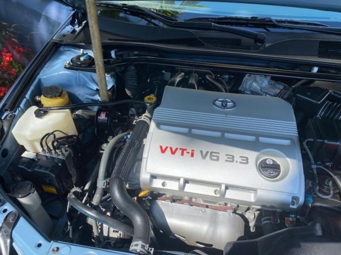 2007 Cosmic Blue Metallic /Ivory Toyota Camry Solara SLE LOW MILES 60,485 1 OWNER FL (4T1FA38P57U) with an 3.3L DOHC SMPI VVT-i 24-Valve V6 Engine engine, Automatic transmission, located at 4701 North Dixie Hwy, Pompano Beach, FL, 33064, (954) 422-2889, 26.240938, -80.123474 - OUR WEBPAGE FLORIDACARS1.COM HAS OVER 100 PHOTOS AND FREE CARFAX LINK 2007 Toyota Camry Solara SLE V6 1 OWNER FL Convertible 3.3L V6 F DOHC 24V Gasoline Front Wheel Drive Features ABS Brakes Air Conditioning Alloy Wheels AM/FM Stereo Automatic Transmission Auxiliary Audio Input Bluetooth Technology - Photo#24