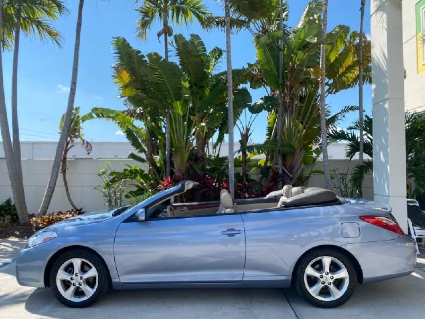 2007 Cosmic Blue Metallic /Ivory Toyota Camry Solara SLE LOW MILES 60,485 1 OWNER FL (4T1FA38P57U) with an 3.3L DOHC SMPI VVT-i 24-Valve V6 Engine engine, Automatic transmission, located at 4701 North Dixie Hwy, Pompano Beach, FL, 33064, (954) 422-2889, 26.240938, -80.123474 - OUR WEBPAGE FLORIDACARS1.COM HAS OVER 100 PHOTOS AND FREE CARFAX LINK 2007 Toyota Camry Solara SLE V6 1 OWNER FL Convertible 3.3L V6 F DOHC 24V Gasoline Front Wheel Drive Features ABS Brakes Air Conditioning Alloy Wheels AM/FM Stereo Automatic Transmission Auxiliary Audio Input Bluetooth Technology - Photo#37