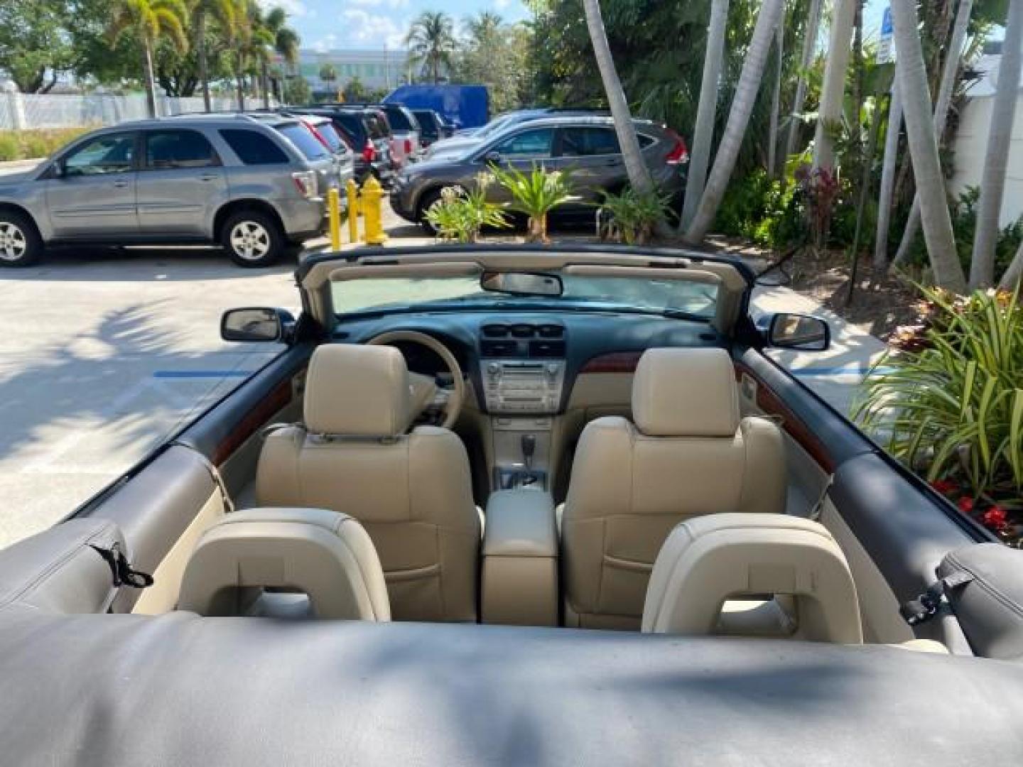 2007 Cosmic Blue Metallic /Ivory Toyota Camry Solara SLE LOW MILES 60,485 1 OWNER FL (4T1FA38P57U) with an 3.3L DOHC SMPI VVT-i 24-Valve V6 Engine engine, Automatic transmission, located at 4701 North Dixie Hwy, Pompano Beach, FL, 33064, (954) 422-2889, 26.240938, -80.123474 - OUR WEBPAGE FLORIDACARS1.COM HAS OVER 100 PHOTOS AND FREE CARFAX LINK 2007 Toyota Camry Solara SLE V6 1 OWNER FL Convertible 3.3L V6 F DOHC 24V Gasoline Front Wheel Drive Features ABS Brakes Air Conditioning Alloy Wheels AM/FM Stereo Automatic Transmission Auxiliary Audio Input Bluetooth Technology - Photo#46