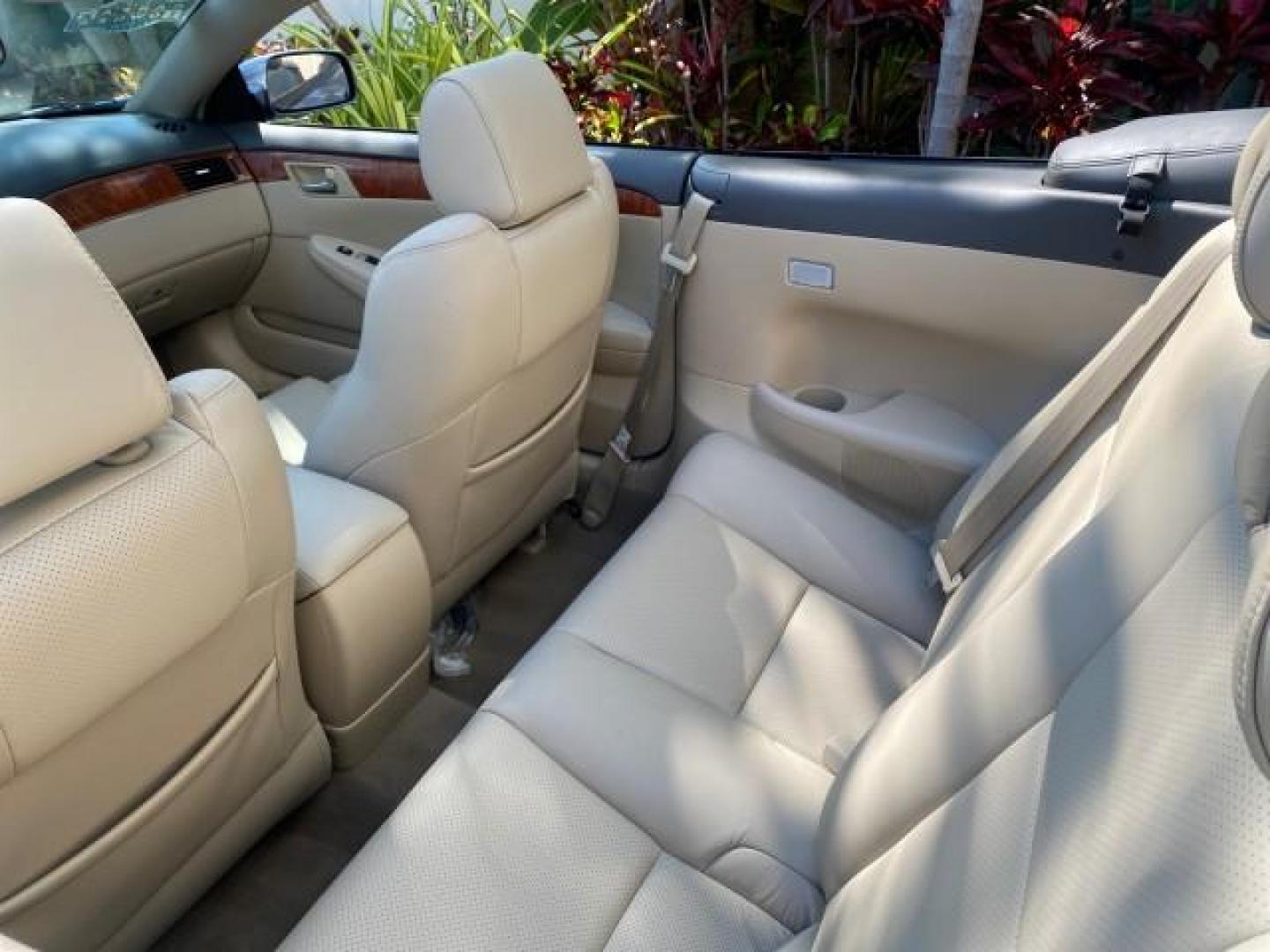 2007 Cosmic Blue Metallic /Ivory Toyota Camry Solara SLE LOW MILES 60,485 1 OWNER FL (4T1FA38P57U) with an 3.3L DOHC SMPI VVT-i 24-Valve V6 Engine engine, Automatic transmission, located at 4701 North Dixie Hwy, Pompano Beach, FL, 33064, (954) 422-2889, 26.240938, -80.123474 - OUR WEBPAGE FLORIDACARS1.COM HAS OVER 100 PHOTOS AND FREE CARFAX LINK 2007 Toyota Camry Solara SLE V6 1 OWNER FL Convertible 3.3L V6 F DOHC 24V Gasoline Front Wheel Drive Features ABS Brakes Air Conditioning Alloy Wheels AM/FM Stereo Automatic Transmission Auxiliary Audio Input Bluetooth Technology - Photo#47