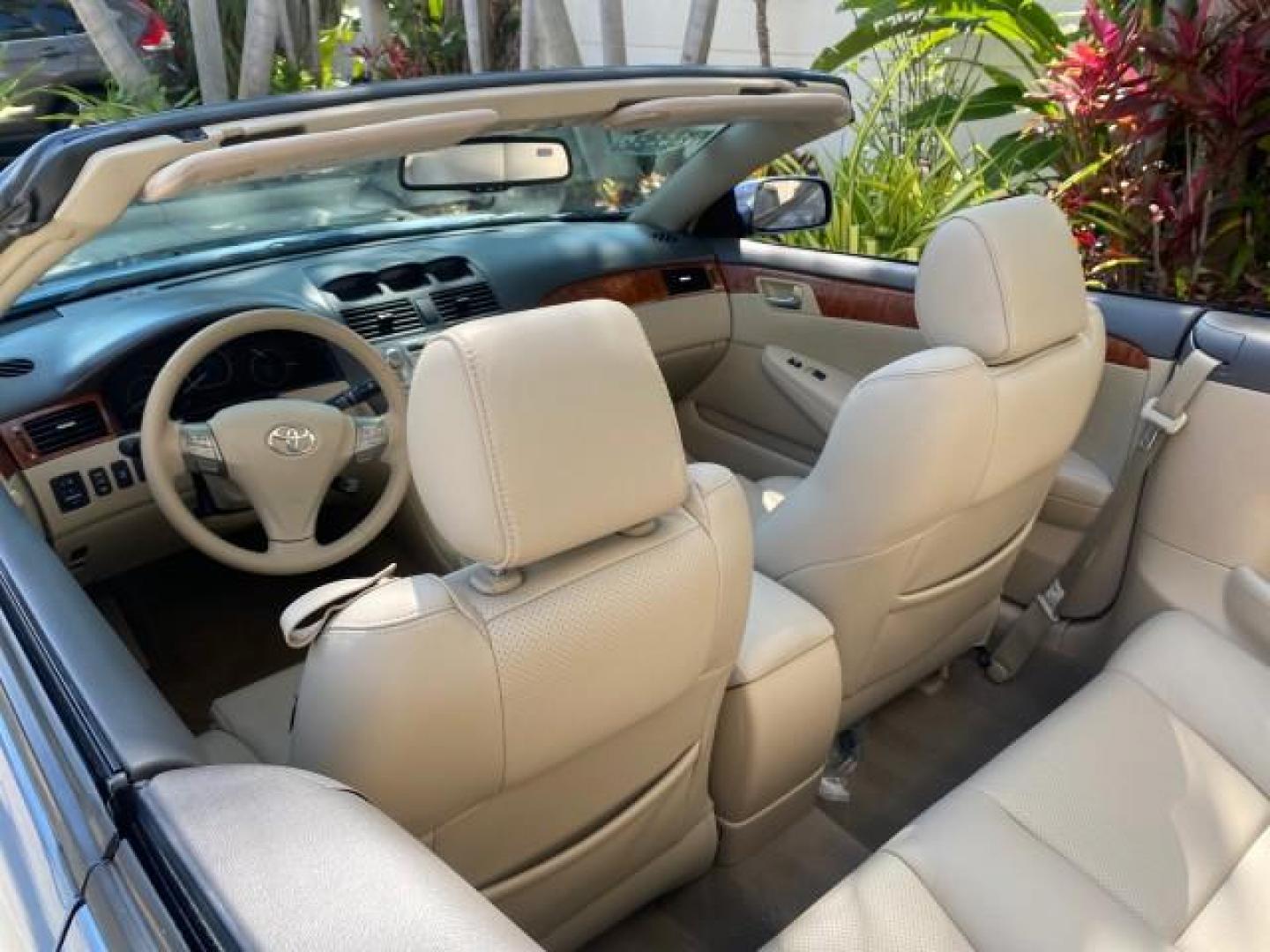 2007 Cosmic Blue Metallic /Ivory Toyota Camry Solara SLE LOW MILES 60,485 1 OWNER FL (4T1FA38P57U) with an 3.3L DOHC SMPI VVT-i 24-Valve V6 Engine engine, Automatic transmission, located at 4701 North Dixie Hwy, Pompano Beach, FL, 33064, (954) 422-2889, 26.240938, -80.123474 - OUR WEBPAGE FLORIDACARS1.COM HAS OVER 100 PHOTOS AND FREE CARFAX LINK 2007 Toyota Camry Solara SLE V6 1 OWNER FL Convertible 3.3L V6 F DOHC 24V Gasoline Front Wheel Drive Features ABS Brakes Air Conditioning Alloy Wheels AM/FM Stereo Automatic Transmission Auxiliary Audio Input Bluetooth Technology - Photo#48