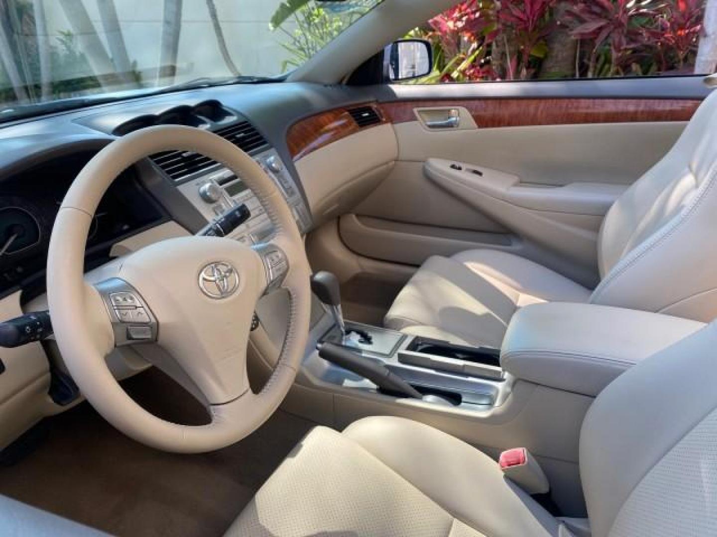 2007 Cosmic Blue Metallic /Ivory Toyota Camry Solara SLE LOW MILES 60,485 1 OWNER FL (4T1FA38P57U) with an 3.3L DOHC SMPI VVT-i 24-Valve V6 Engine engine, Automatic transmission, located at 4701 North Dixie Hwy, Pompano Beach, FL, 33064, (954) 422-2889, 26.240938, -80.123474 - OUR WEBPAGE FLORIDACARS1.COM HAS OVER 100 PHOTOS AND FREE CARFAX LINK 2007 Toyota Camry Solara SLE V6 1 OWNER FL Convertible 3.3L V6 F DOHC 24V Gasoline Front Wheel Drive Features ABS Brakes Air Conditioning Alloy Wheels AM/FM Stereo Automatic Transmission Auxiliary Audio Input Bluetooth Technology - Photo#50