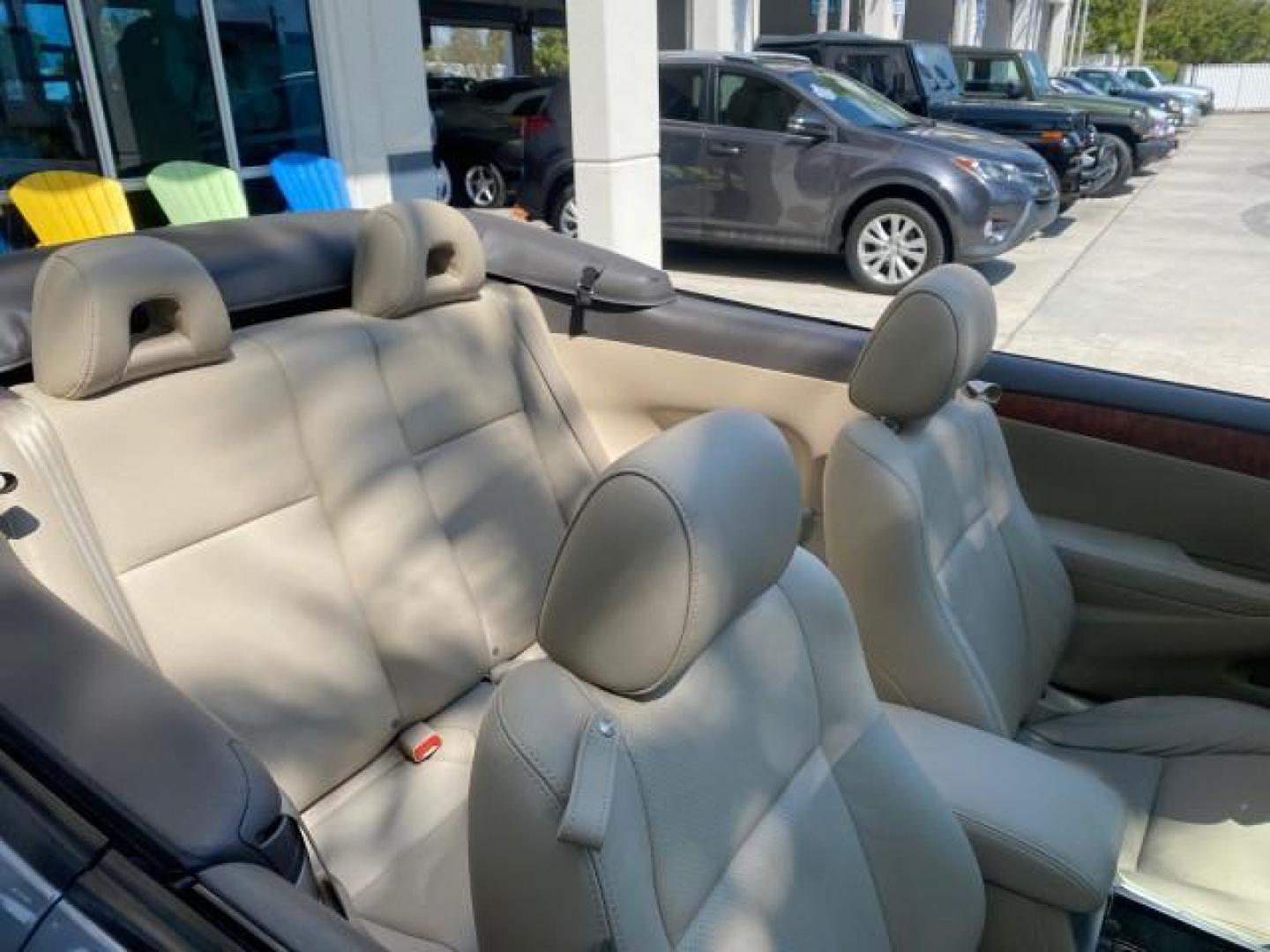 2007 Cosmic Blue Metallic /Ivory Toyota Camry Solara SLE LOW MILES 60,485 1 OWNER FL (4T1FA38P57U) with an 3.3L DOHC SMPI VVT-i 24-Valve V6 Engine engine, Automatic transmission, located at 4701 North Dixie Hwy, Pompano Beach, FL, 33064, (954) 422-2889, 26.240938, -80.123474 - OUR WEBPAGE FLORIDACARS1.COM HAS OVER 100 PHOTOS AND FREE CARFAX LINK 2007 Toyota Camry Solara SLE V6 1 OWNER FL Convertible 3.3L V6 F DOHC 24V Gasoline Front Wheel Drive Features ABS Brakes Air Conditioning Alloy Wheels AM/FM Stereo Automatic Transmission Auxiliary Audio Input Bluetooth Technology - Photo#52