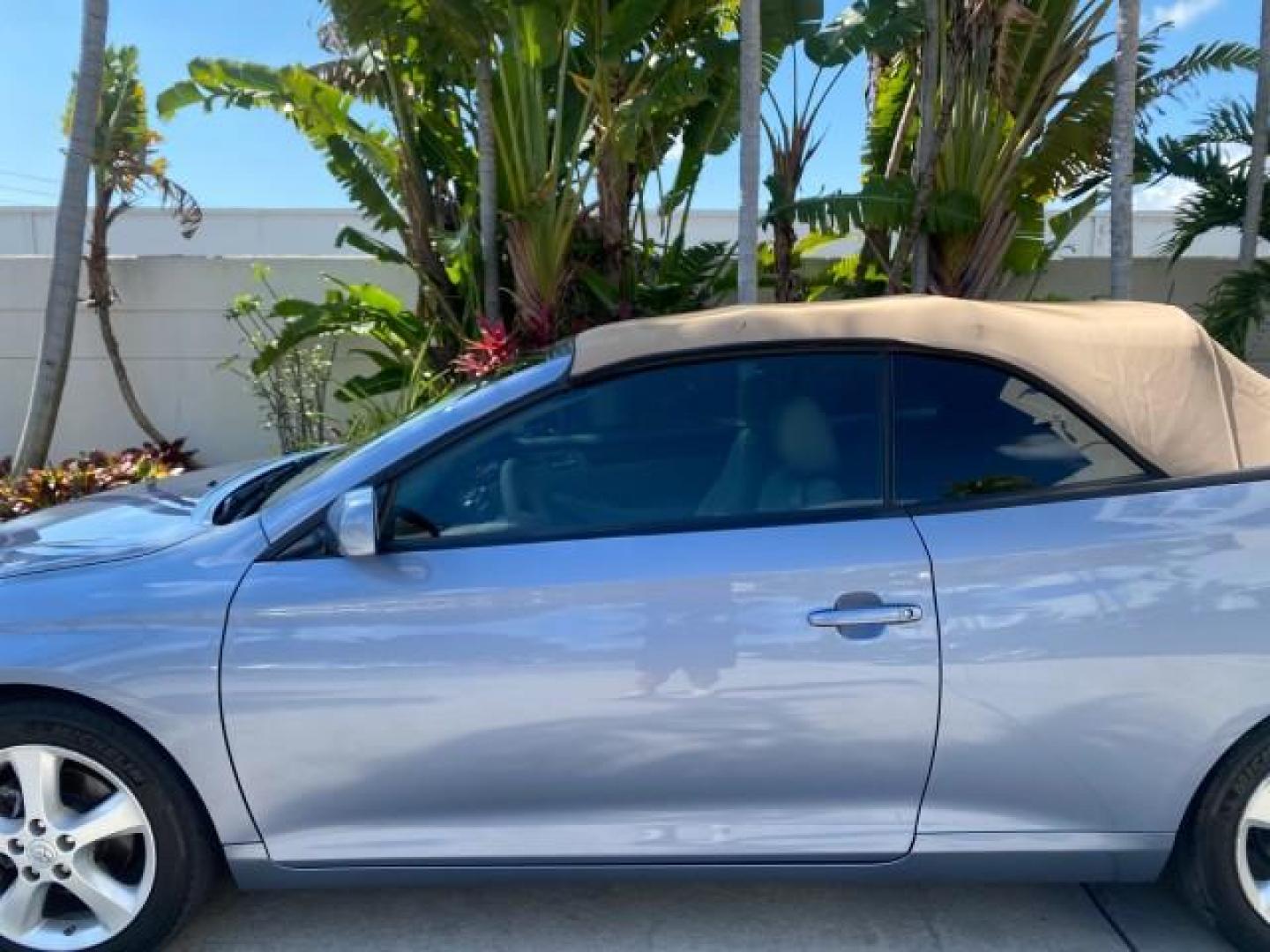 2007 Cosmic Blue Metallic /Ivory Toyota Camry Solara SLE LOW MILES 60,485 1 OWNER FL (4T1FA38P57U) with an 3.3L DOHC SMPI VVT-i 24-Valve V6 Engine engine, Automatic transmission, located at 4701 North Dixie Hwy, Pompano Beach, FL, 33064, (954) 422-2889, 26.240938, -80.123474 - OUR WEBPAGE FLORIDACARS1.COM HAS OVER 100 PHOTOS AND FREE CARFAX LINK 2007 Toyota Camry Solara SLE V6 1 OWNER FL Convertible 3.3L V6 F DOHC 24V Gasoline Front Wheel Drive Features ABS Brakes Air Conditioning Alloy Wheels AM/FM Stereo Automatic Transmission Auxiliary Audio Input Bluetooth Technology - Photo#56