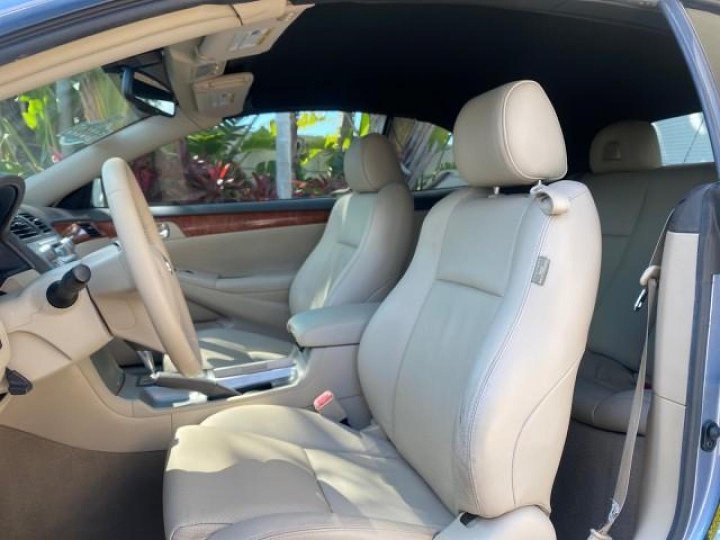 2007 Cosmic Blue Metallic /Ivory Toyota Camry Solara SLE LOW MILES 60,485 1 OWNER FL (4T1FA38P57U) with an 3.3L DOHC SMPI VVT-i 24-Valve V6 Engine engine, Automatic transmission, located at 4701 North Dixie Hwy, Pompano Beach, FL, 33064, (954) 422-2889, 26.240938, -80.123474 - OUR WEBPAGE FLORIDACARS1.COM HAS OVER 100 PHOTOS AND FREE CARFAX LINK 2007 Toyota Camry Solara SLE V6 1 OWNER FL Convertible 3.3L V6 F DOHC 24V Gasoline Front Wheel Drive Features ABS Brakes Air Conditioning Alloy Wheels AM/FM Stereo Automatic Transmission Auxiliary Audio Input Bluetooth Technology - Photo#61