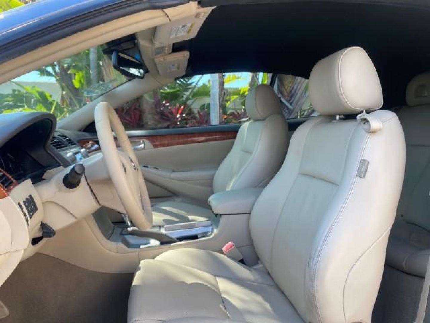 2007 Cosmic Blue Metallic /Ivory Toyota Camry Solara SLE LOW MILES 60,485 1 OWNER FL (4T1FA38P57U) with an 3.3L DOHC SMPI VVT-i 24-Valve V6 Engine engine, Automatic transmission, located at 4701 North Dixie Hwy, Pompano Beach, FL, 33064, (954) 422-2889, 26.240938, -80.123474 - OUR WEBPAGE FLORIDACARS1.COM HAS OVER 100 PHOTOS AND FREE CARFAX LINK 2007 Toyota Camry Solara SLE V6 1 OWNER FL Convertible 3.3L V6 F DOHC 24V Gasoline Front Wheel Drive Features ABS Brakes Air Conditioning Alloy Wheels AM/FM Stereo Automatic Transmission Auxiliary Audio Input Bluetooth Technology - Photo#62