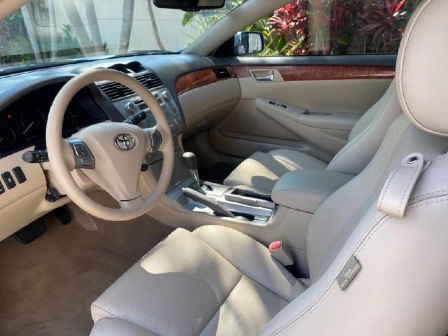 2007 Cosmic Blue Metallic /Ivory Toyota Camry Solara SLE LOW MILES 60,485 1 OWNER FL (4T1FA38P57U) with an 3.3L DOHC SMPI VVT-i 24-Valve V6 Engine engine, Automatic transmission, located at 4701 North Dixie Hwy, Pompano Beach, FL, 33064, (954) 422-2889, 26.240938, -80.123474 - OUR WEBPAGE FLORIDACARS1.COM HAS OVER 100 PHOTOS AND FREE CARFAX LINK 2007 Toyota Camry Solara SLE V6 1 OWNER FL Convertible 3.3L V6 F DOHC 24V Gasoline Front Wheel Drive Features ABS Brakes Air Conditioning Alloy Wheels AM/FM Stereo Automatic Transmission Auxiliary Audio Input Bluetooth Technology - Photo#64