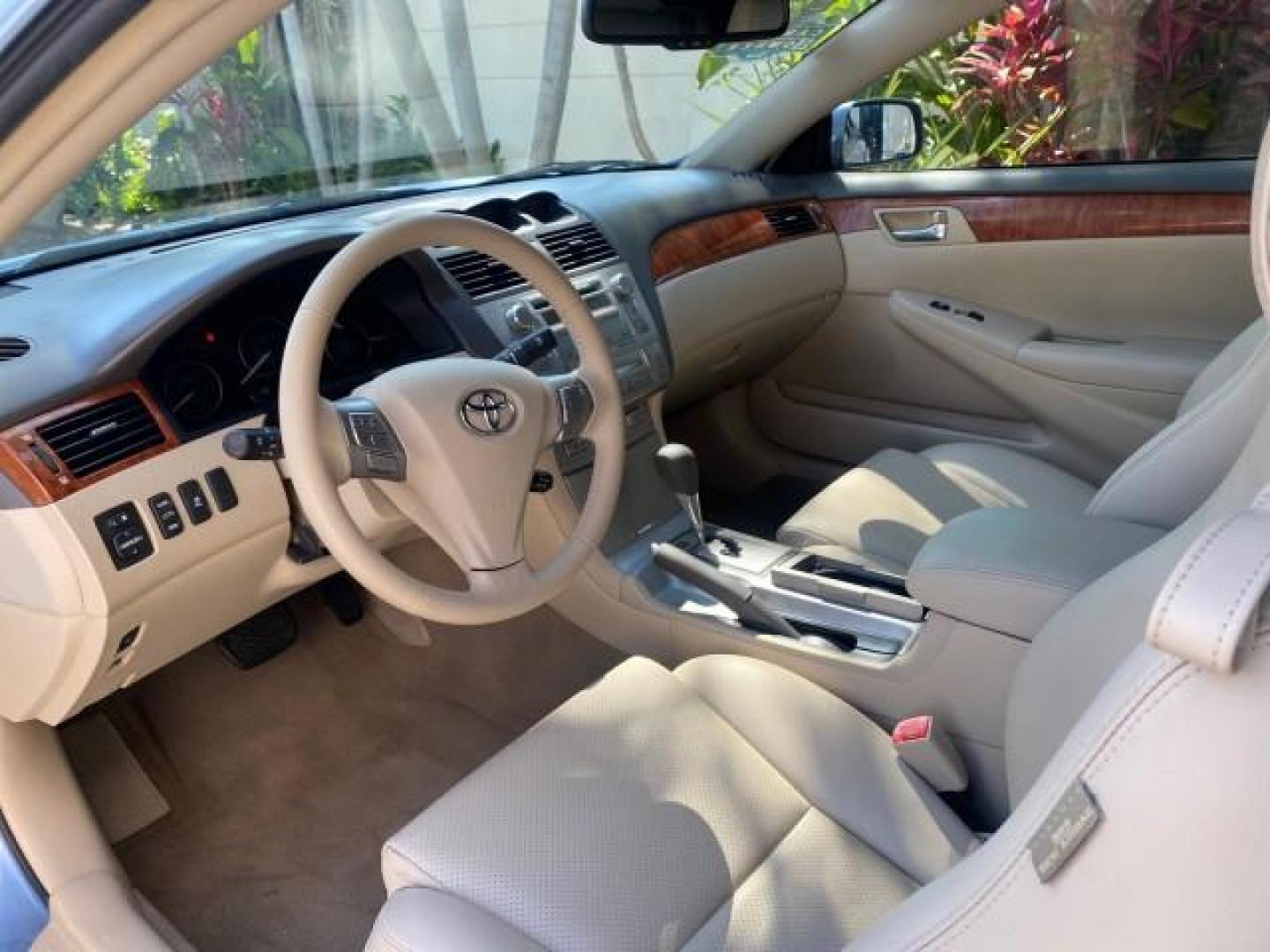 2007 Cosmic Blue Metallic /Ivory Toyota Camry Solara SLE LOW MILES 60,485 1 OWNER FL (4T1FA38P57U) with an 3.3L DOHC SMPI VVT-i 24-Valve V6 Engine engine, Automatic transmission, located at 4701 North Dixie Hwy, Pompano Beach, FL, 33064, (954) 422-2889, 26.240938, -80.123474 - OUR WEBPAGE FLORIDACARS1.COM HAS OVER 100 PHOTOS AND FREE CARFAX LINK 2007 Toyota Camry Solara SLE V6 1 OWNER FL Convertible 3.3L V6 F DOHC 24V Gasoline Front Wheel Drive Features ABS Brakes Air Conditioning Alloy Wheels AM/FM Stereo Automatic Transmission Auxiliary Audio Input Bluetooth Technology - Photo#65