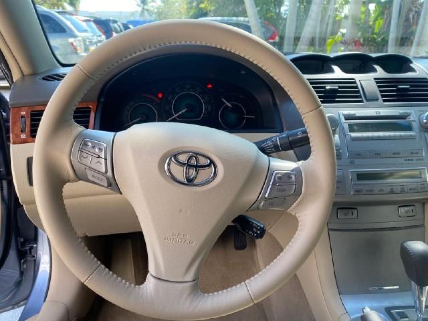 2007 Cosmic Blue Metallic /Ivory Toyota Camry Solara SLE LOW MILES 60,485 1 OWNER FL (4T1FA38P57U) with an 3.3L DOHC SMPI VVT-i 24-Valve V6 Engine engine, Automatic transmission, located at 4701 North Dixie Hwy, Pompano Beach, FL, 33064, (954) 422-2889, 26.240938, -80.123474 - OUR WEBPAGE FLORIDACARS1.COM HAS OVER 100 PHOTOS AND FREE CARFAX LINK 2007 Toyota Camry Solara SLE V6 1 OWNER FL Convertible 3.3L V6 F DOHC 24V Gasoline Front Wheel Drive Features ABS Brakes Air Conditioning Alloy Wheels AM/FM Stereo Automatic Transmission Auxiliary Audio Input Bluetooth Technology - Photo#67