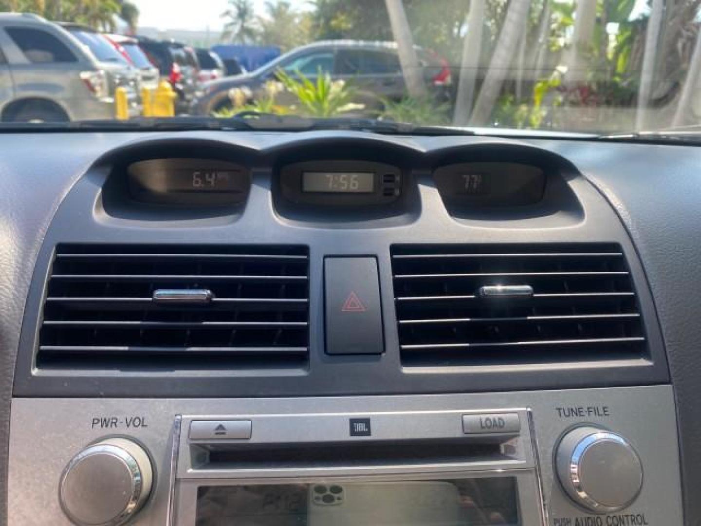 2007 Cosmic Blue Metallic /Ivory Toyota Camry Solara SLE LOW MILES 60,485 1 OWNER FL (4T1FA38P57U) with an 3.3L DOHC SMPI VVT-i 24-Valve V6 Engine engine, Automatic transmission, located at 4701 North Dixie Hwy, Pompano Beach, FL, 33064, (954) 422-2889, 26.240938, -80.123474 - OUR WEBPAGE FLORIDACARS1.COM HAS OVER 100 PHOTOS AND FREE CARFAX LINK 2007 Toyota Camry Solara SLE V6 1 OWNER FL Convertible 3.3L V6 F DOHC 24V Gasoline Front Wheel Drive Features ABS Brakes Air Conditioning Alloy Wheels AM/FM Stereo Automatic Transmission Auxiliary Audio Input Bluetooth Technology - Photo#76