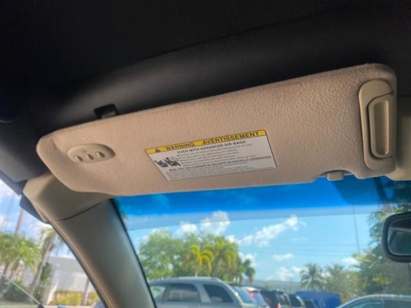 2007 Cosmic Blue Metallic /Ivory Toyota Camry Solara SLE LOW MILES 60,485 1 OWNER FL (4T1FA38P57U) with an 3.3L DOHC SMPI VVT-i 24-Valve V6 Engine engine, Automatic transmission, located at 4701 North Dixie Hwy, Pompano Beach, FL, 33064, (954) 422-2889, 26.240938, -80.123474 - OUR WEBPAGE FLORIDACARS1.COM HAS OVER 100 PHOTOS AND FREE CARFAX LINK 2007 Toyota Camry Solara SLE V6 1 OWNER FL Convertible 3.3L V6 F DOHC 24V Gasoline Front Wheel Drive Features ABS Brakes Air Conditioning Alloy Wheels AM/FM Stereo Automatic Transmission Auxiliary Audio Input Bluetooth Technology - Photo#83